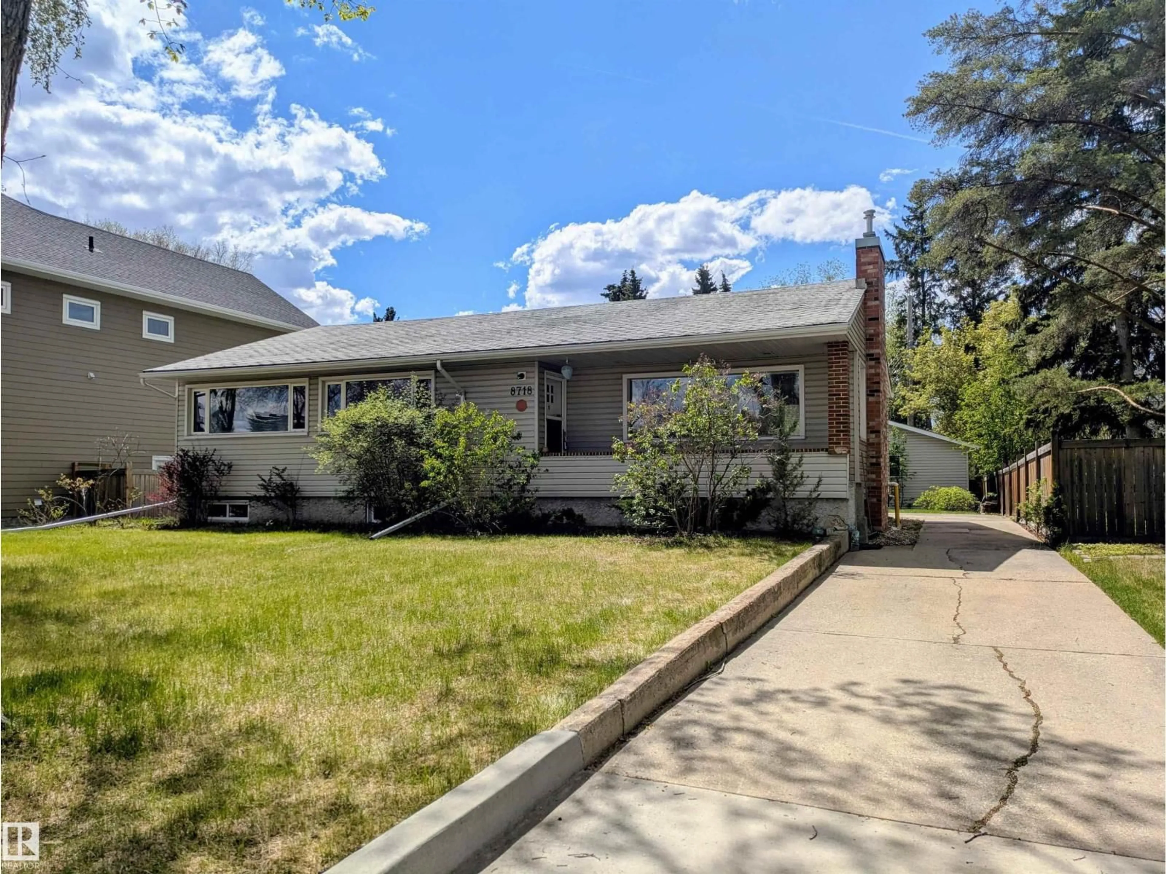 Home with vinyl exterior material, street for NW - 8718 119 ST, Edmonton Alberta T6G1W8