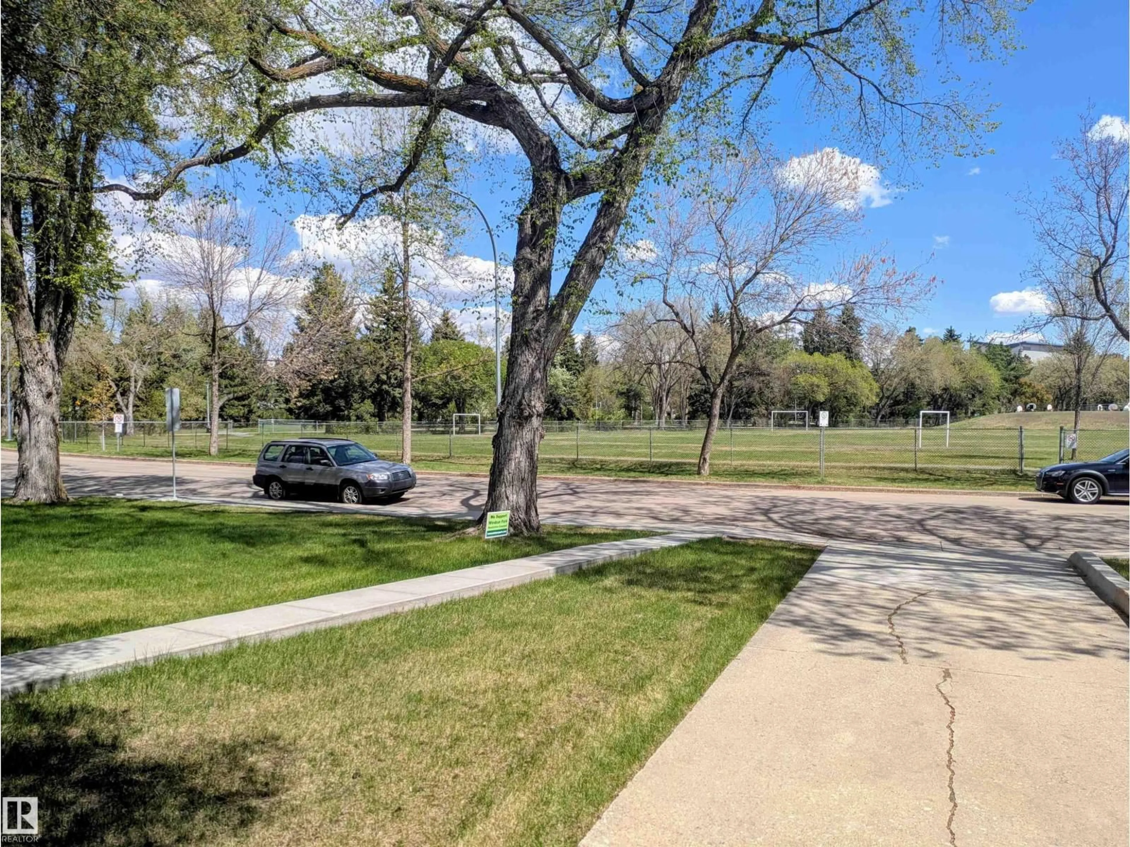 A pic from outside/outdoor area/front of a property/back of a property/a pic from drone, street for NW - 8718 119 ST, Edmonton Alberta T6G1W8