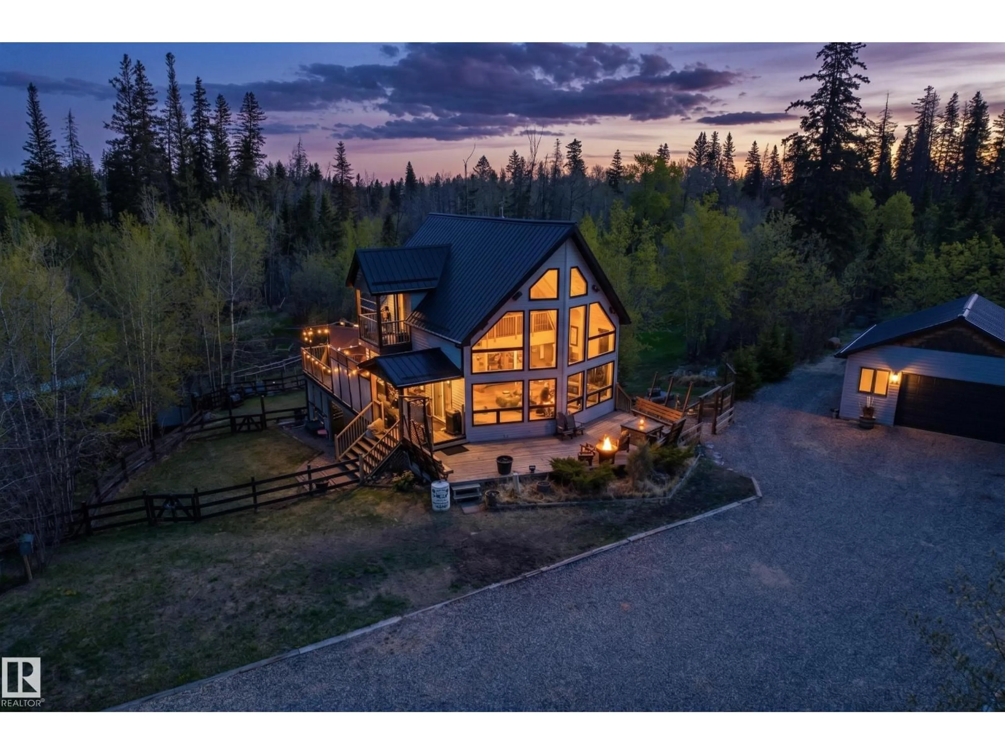 A pic from outside/outdoor area/front of a property/back of a property/a pic from drone, mountain view for #26 - 57108 RGE ROAD 220, Rural Sturgeon County Alberta T0A2W0