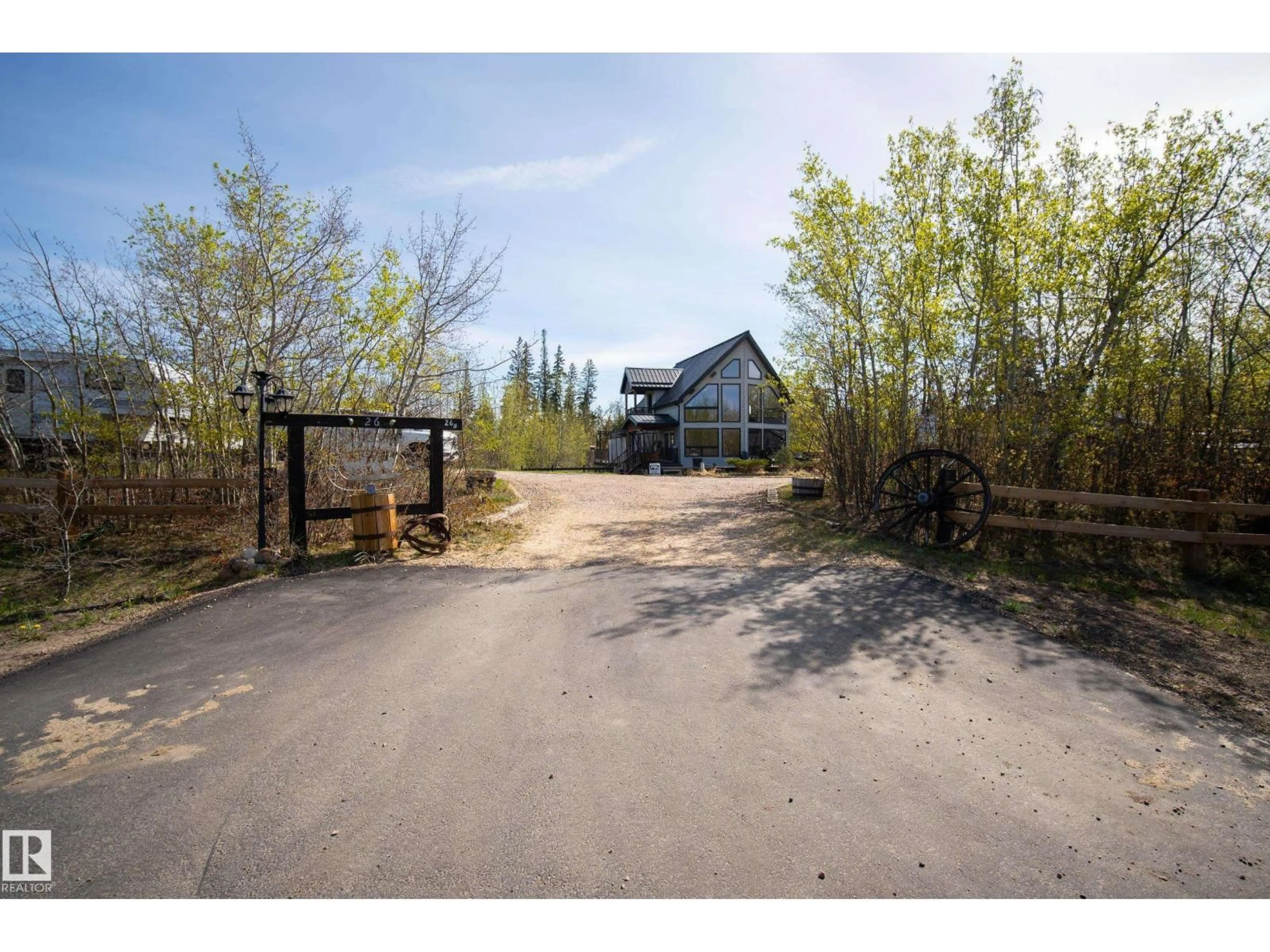 A pic from outside/outdoor area/front of a property/back of a property/a pic from drone, unknown for #26 - 57108 RGE ROAD 220, Rural Sturgeon County Alberta T0A2W0
