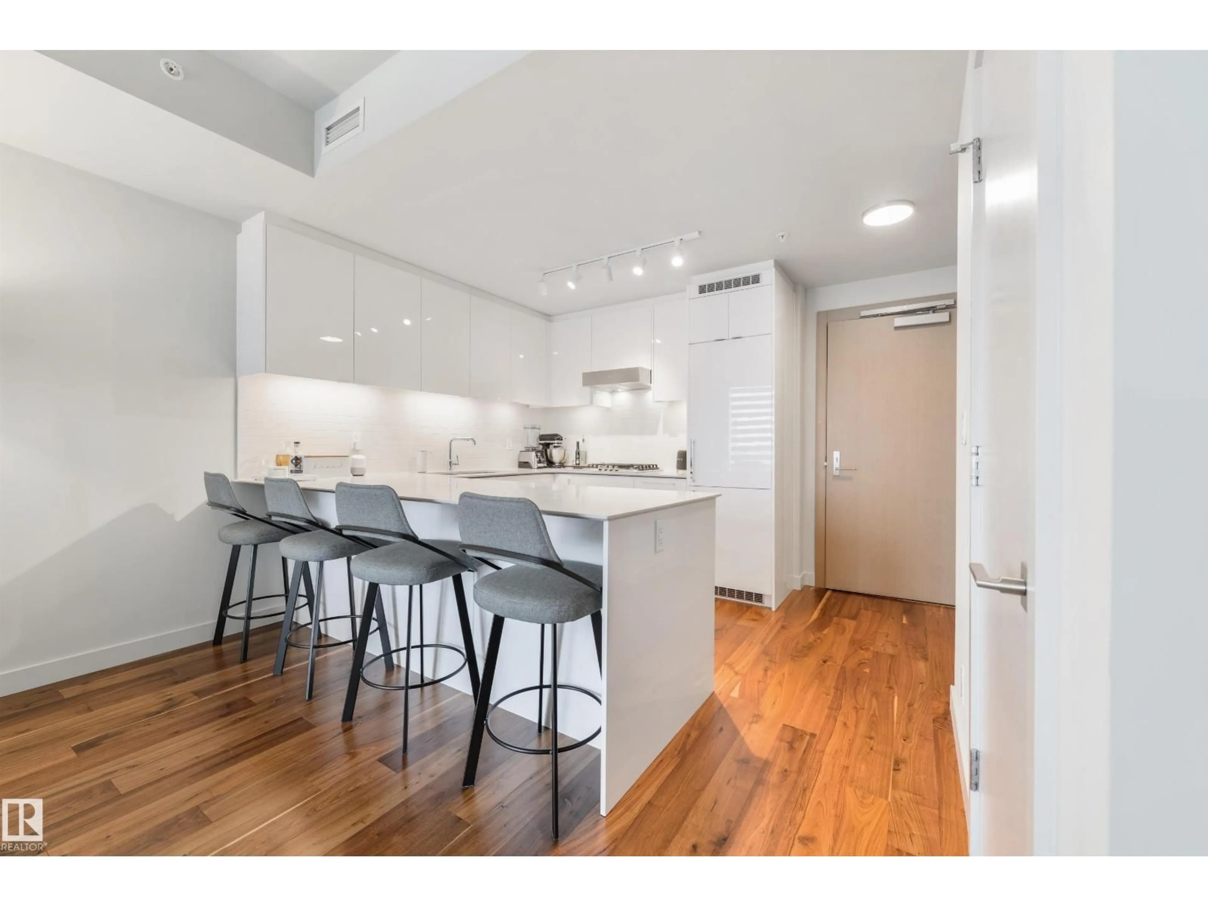 Open concept kitchen, wood/laminate floor for 4103 - 10360 102 ST NW, Edmonton Alberta T5J0K6