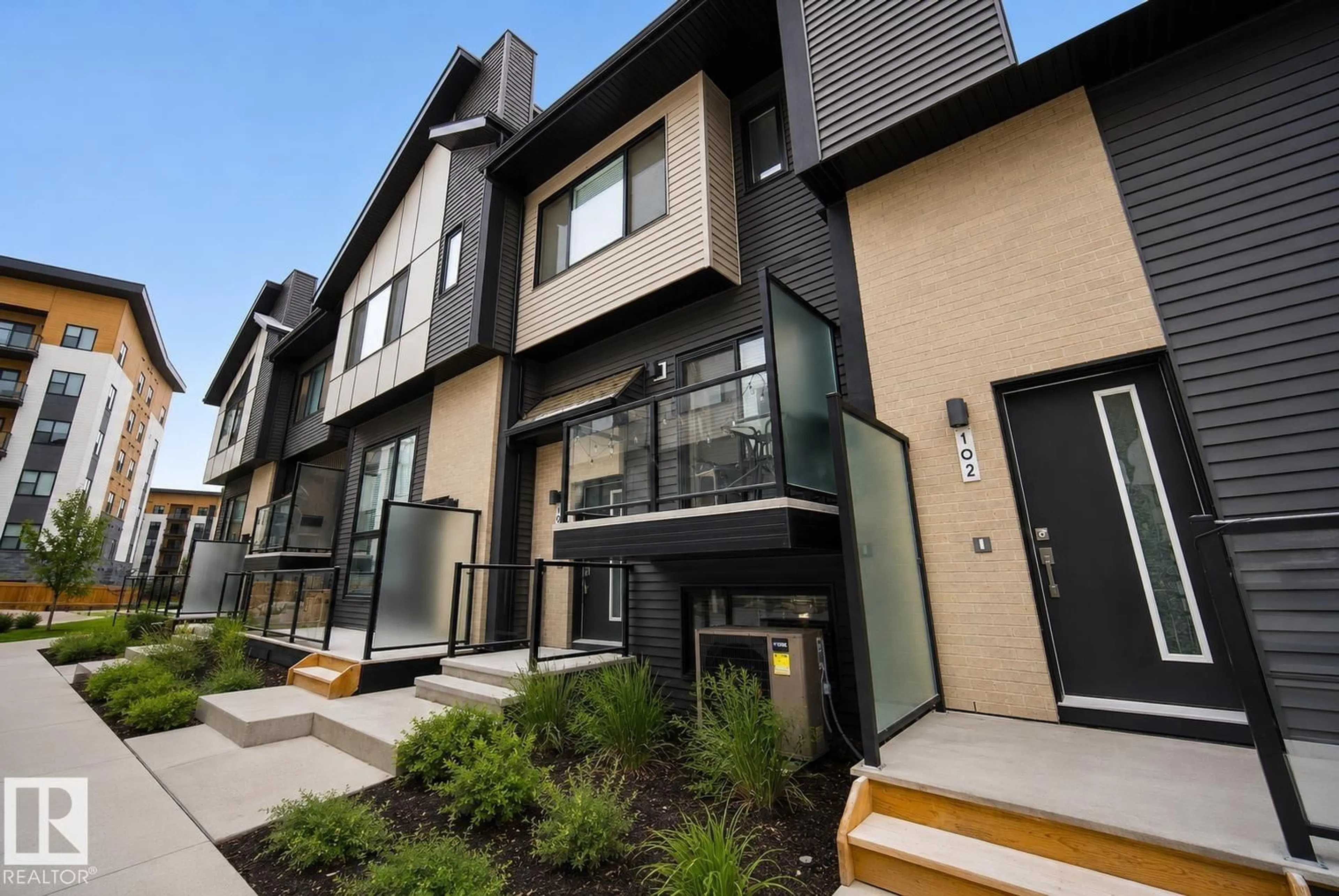 Home with brick exterior material, street for #104 - 104 50 EBONY BV, Sherwood Park Alberta T8H2X4