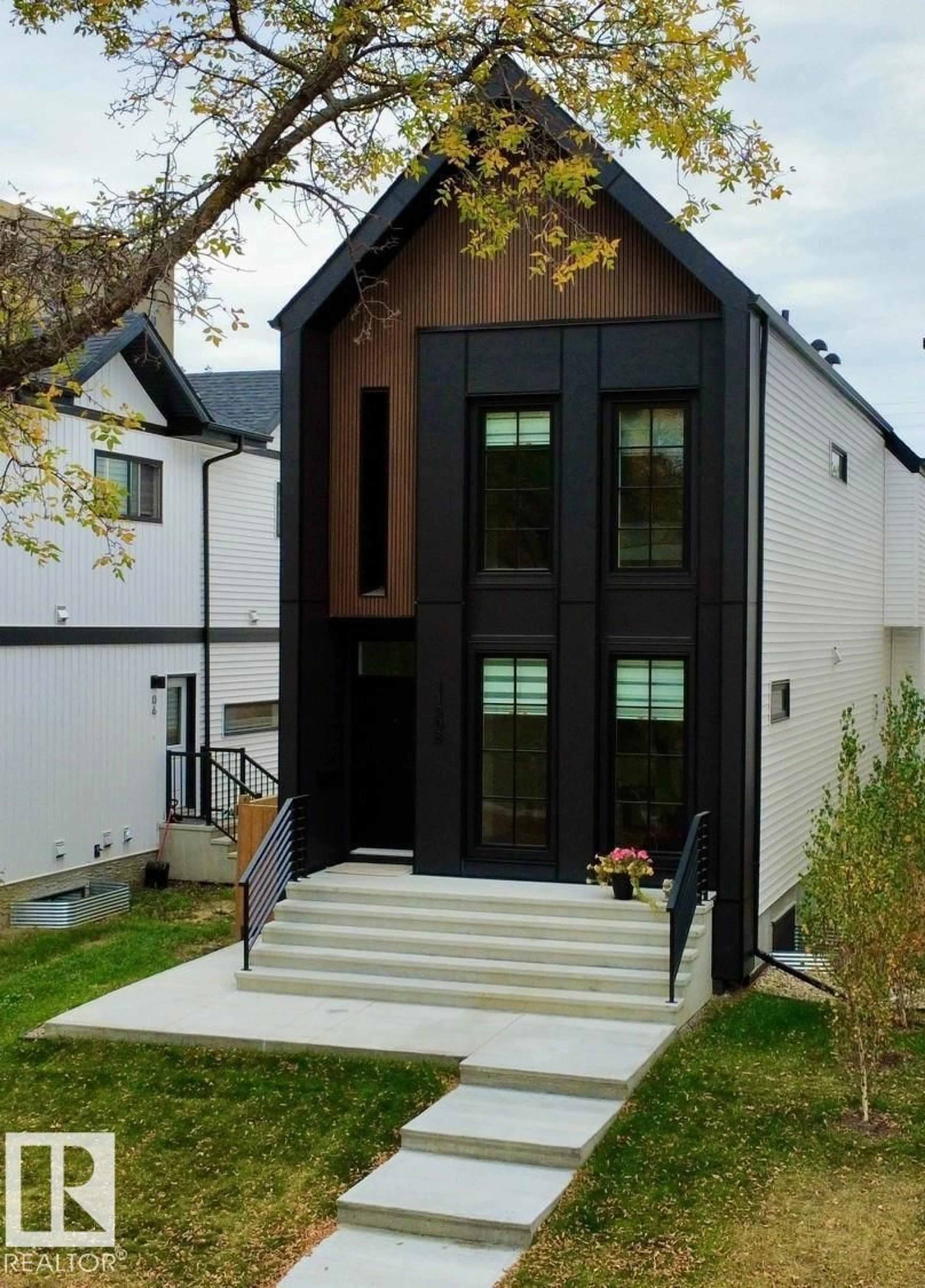 Home with brick exterior material, street for 11308 128 ST NW, Edmonton Alberta T5M0W9