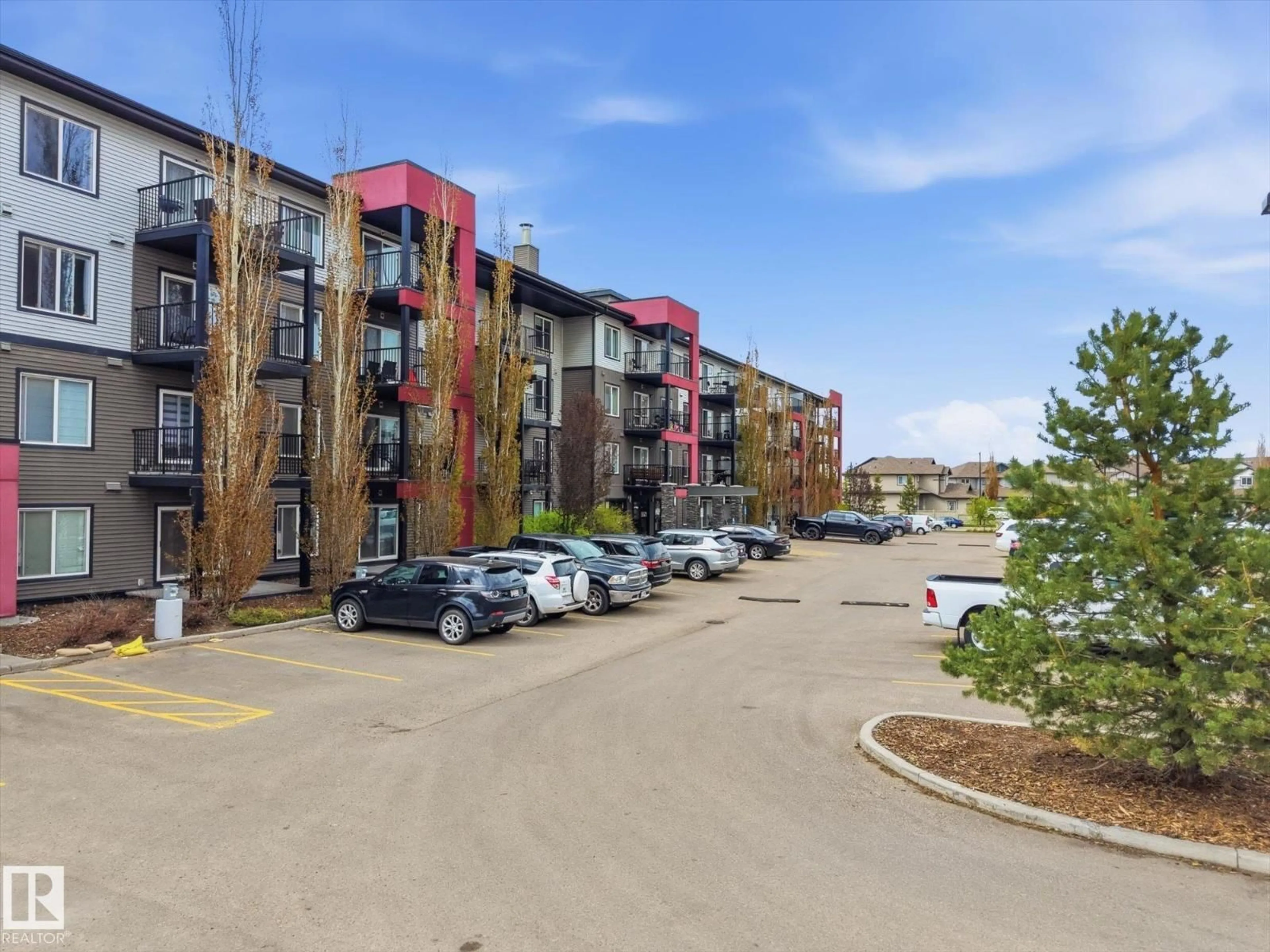 A pic from outside/outdoor area/front of a property/back of a property/a pic from drone, street for 302 - 5521 7 AV SW, Edmonton Alberta T6X2A8