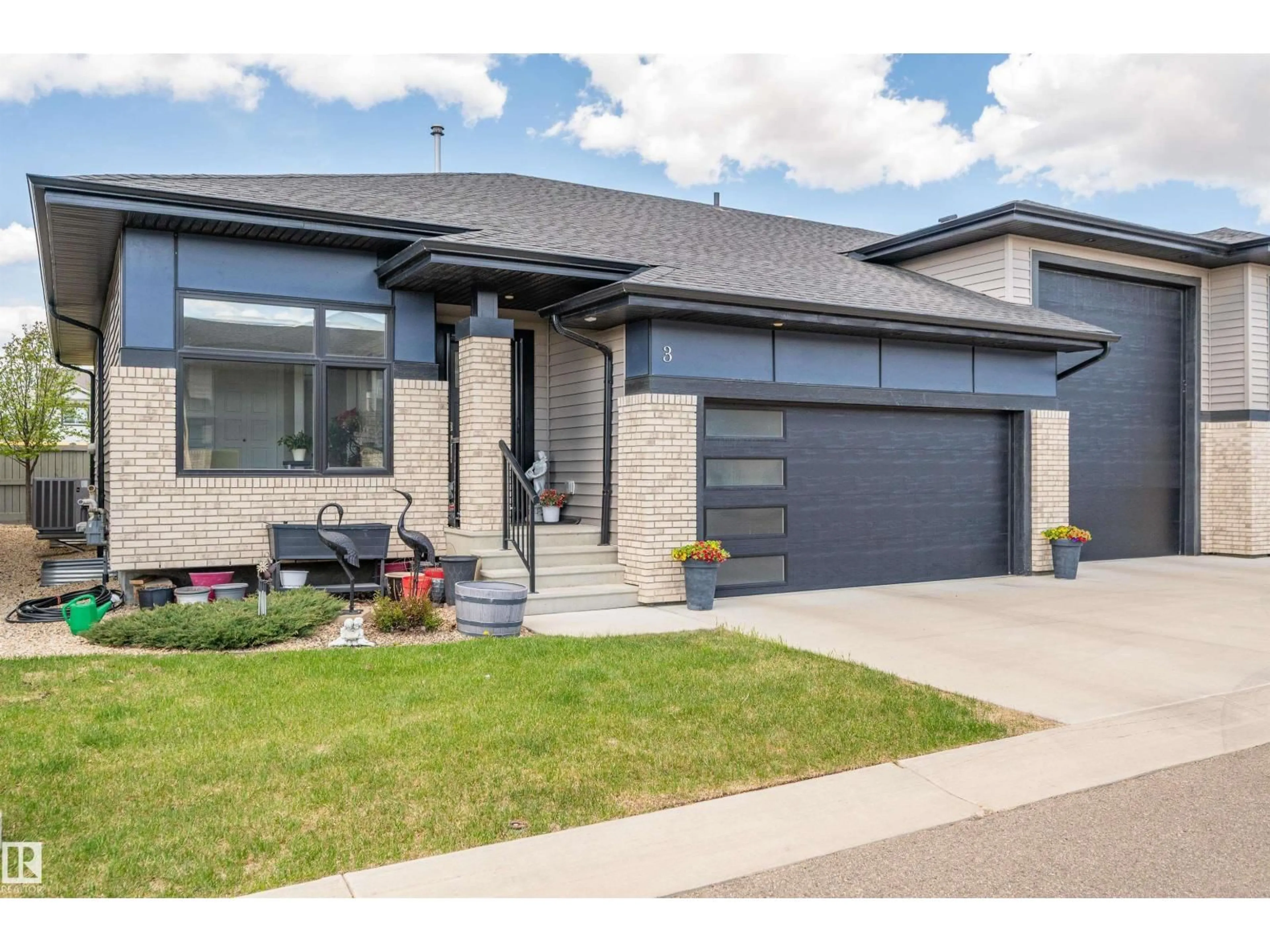Home with brick exterior material, street for #3 - 103 ALLARD LI, Edmonton Alberta T6W0R5