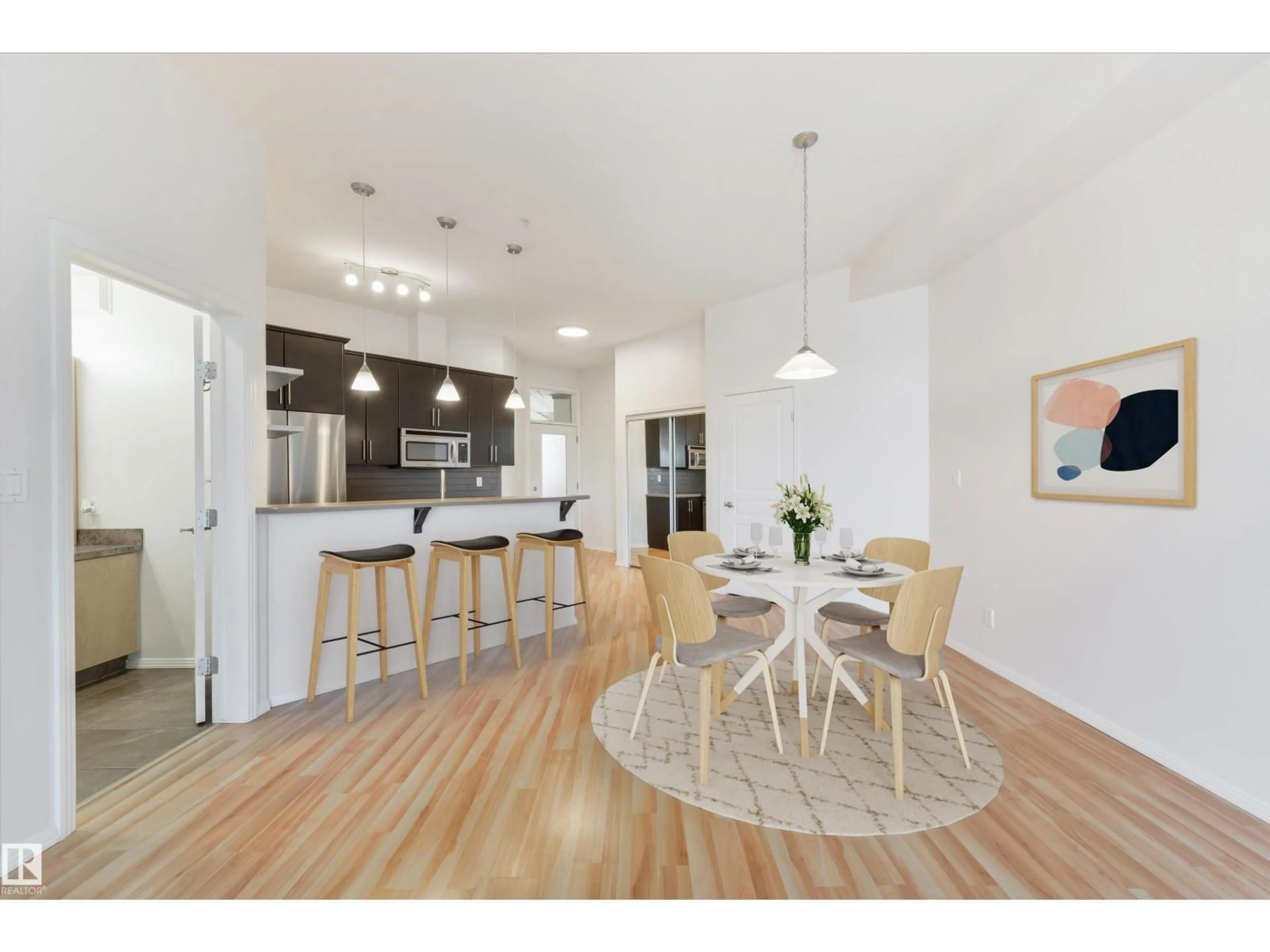 Open concept kitchen, wood/laminate floor for 405 - 10531 117 ST, Edmonton Alberta T5H0A8