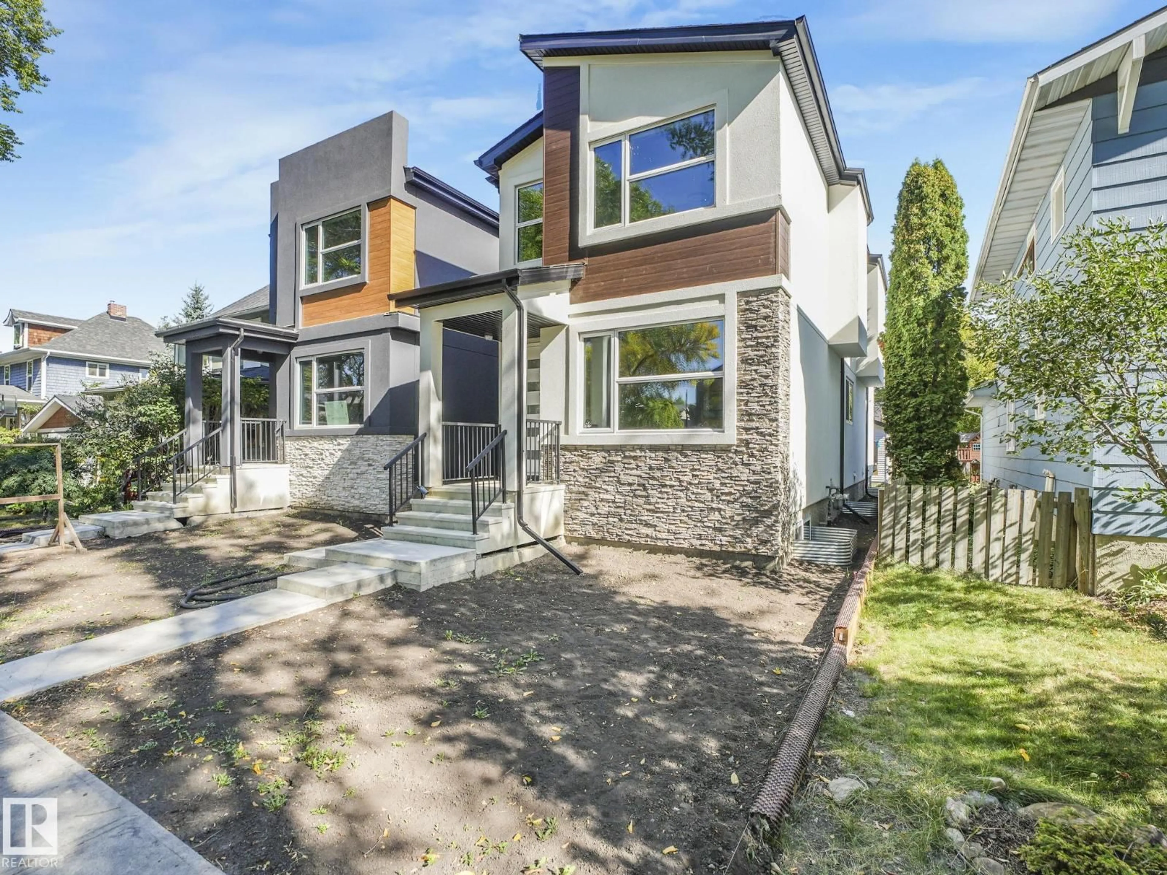 Home with brick exterior material, street for 10963 129 ST, Edmonton Alberta T5M0Y2