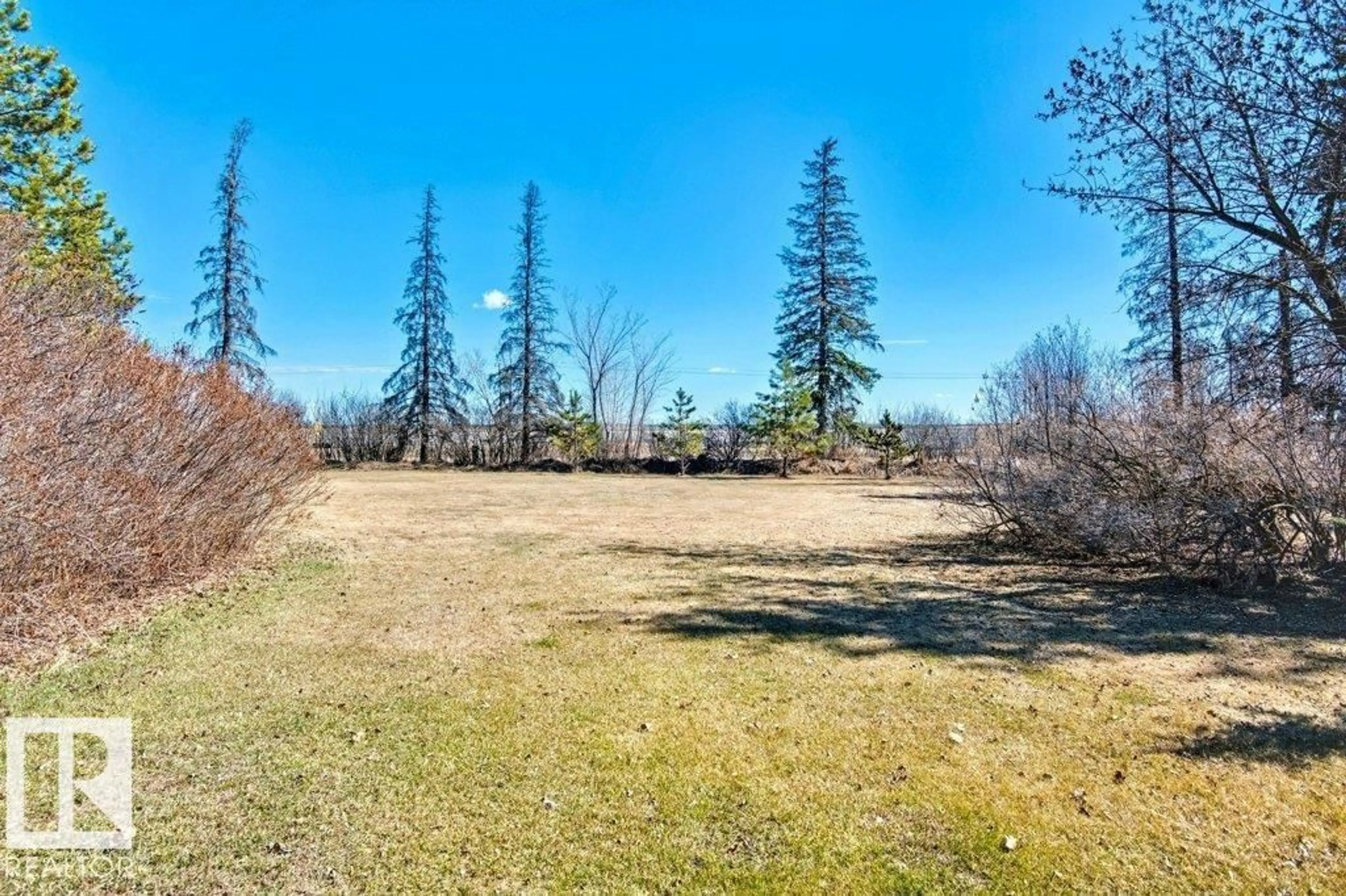 A pic from outside/outdoor area/front of a property/back of a property/a pic from drone, forest/trees view for 6201 HWY 831, Rural Lamont County Alberta T0B2R0