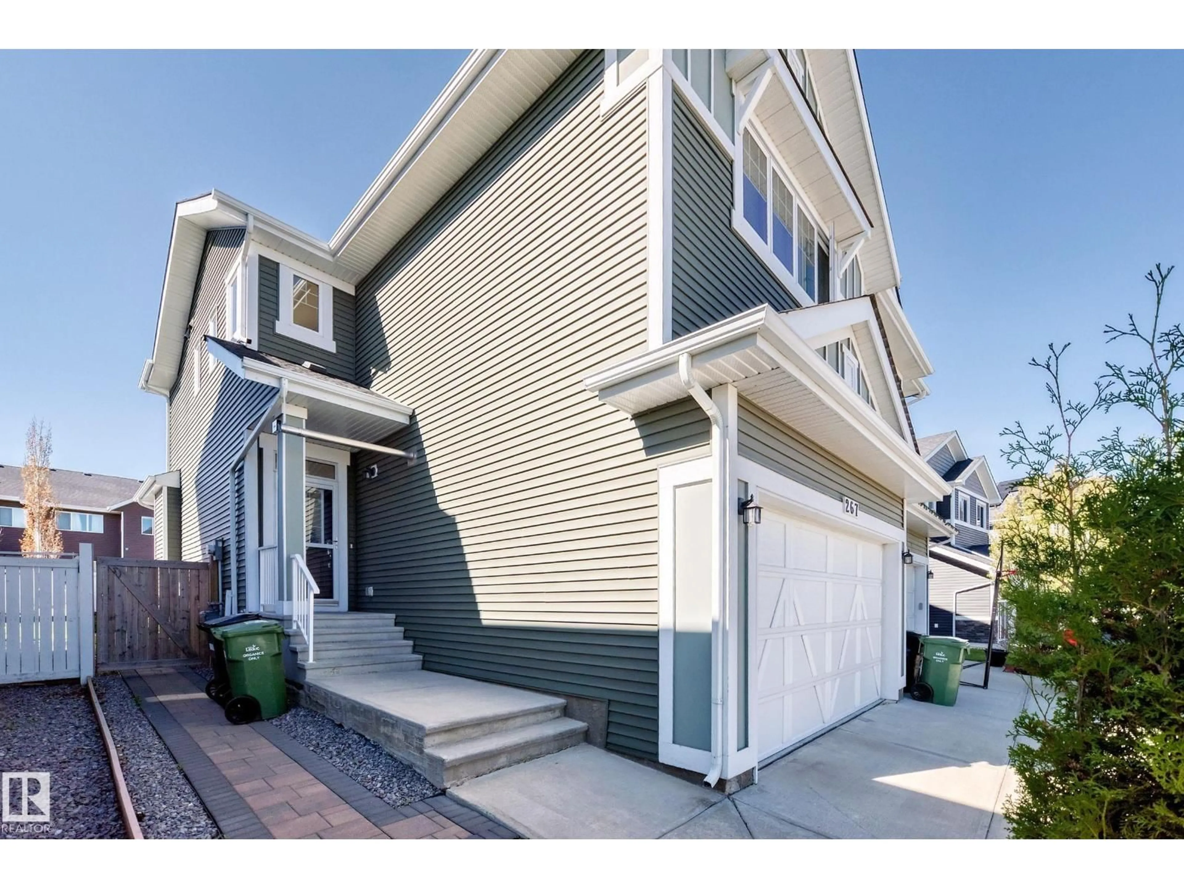 Home with vinyl exterior material, street for 267 STURTZ BN, Leduc Alberta T9E0X4