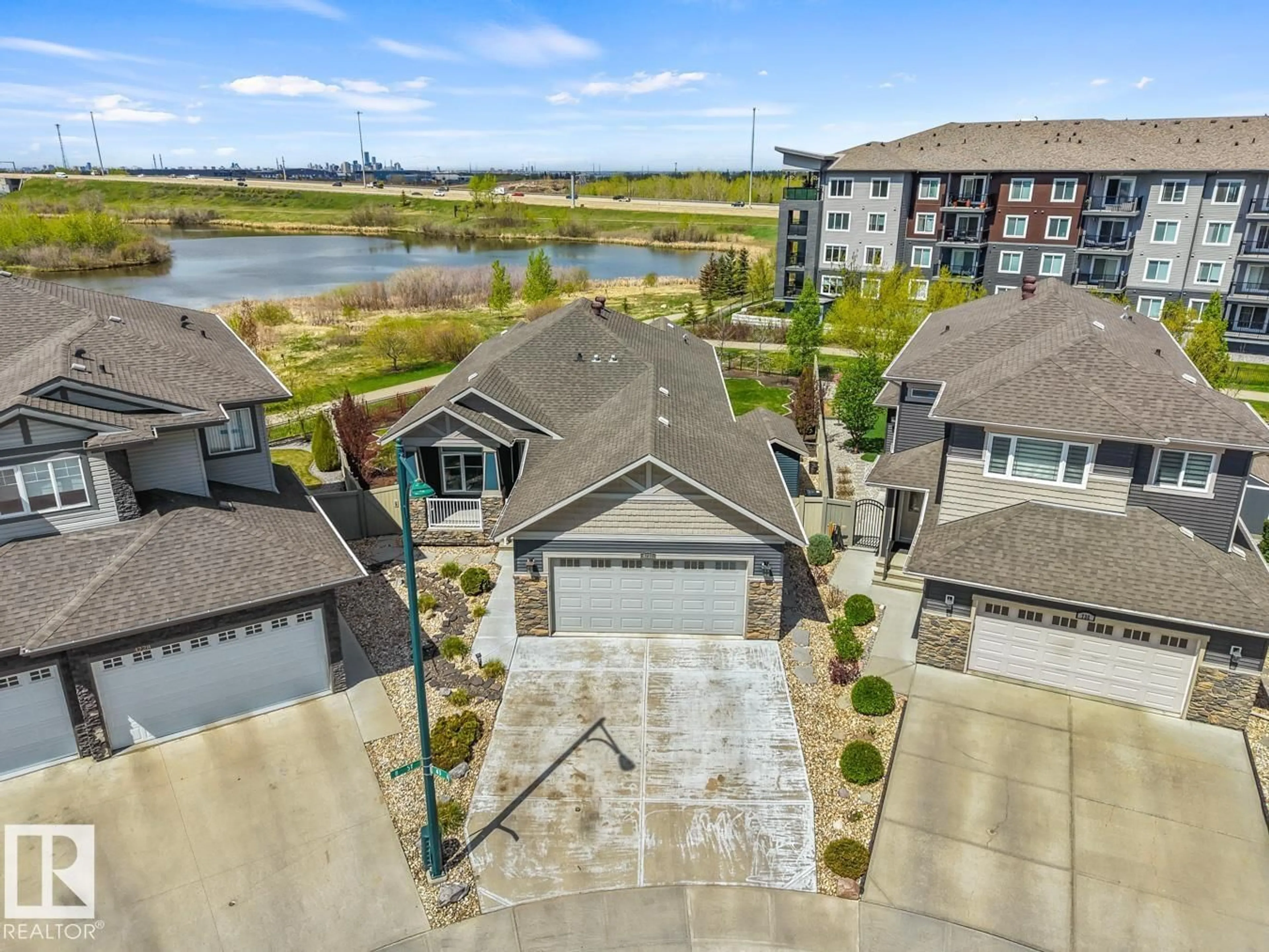 A pic from outside/outdoor area/front of a property/back of a property/a pic from drone, water/lake/river/ocean view for 4232 8 ST, Edmonton Alberta T6T0W7