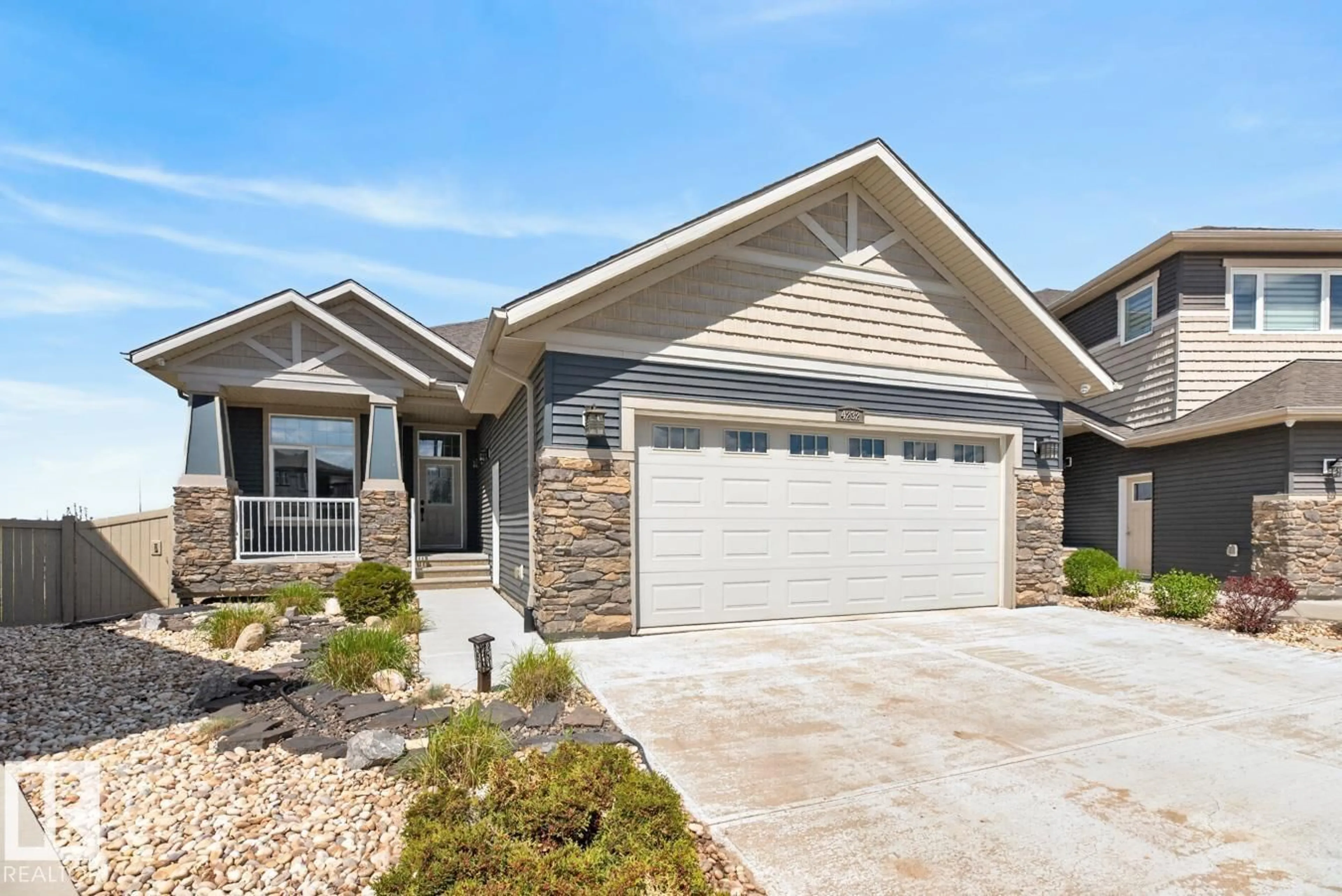 Home with vinyl exterior material, street for 4232 8 ST, Edmonton Alberta T6T0W7