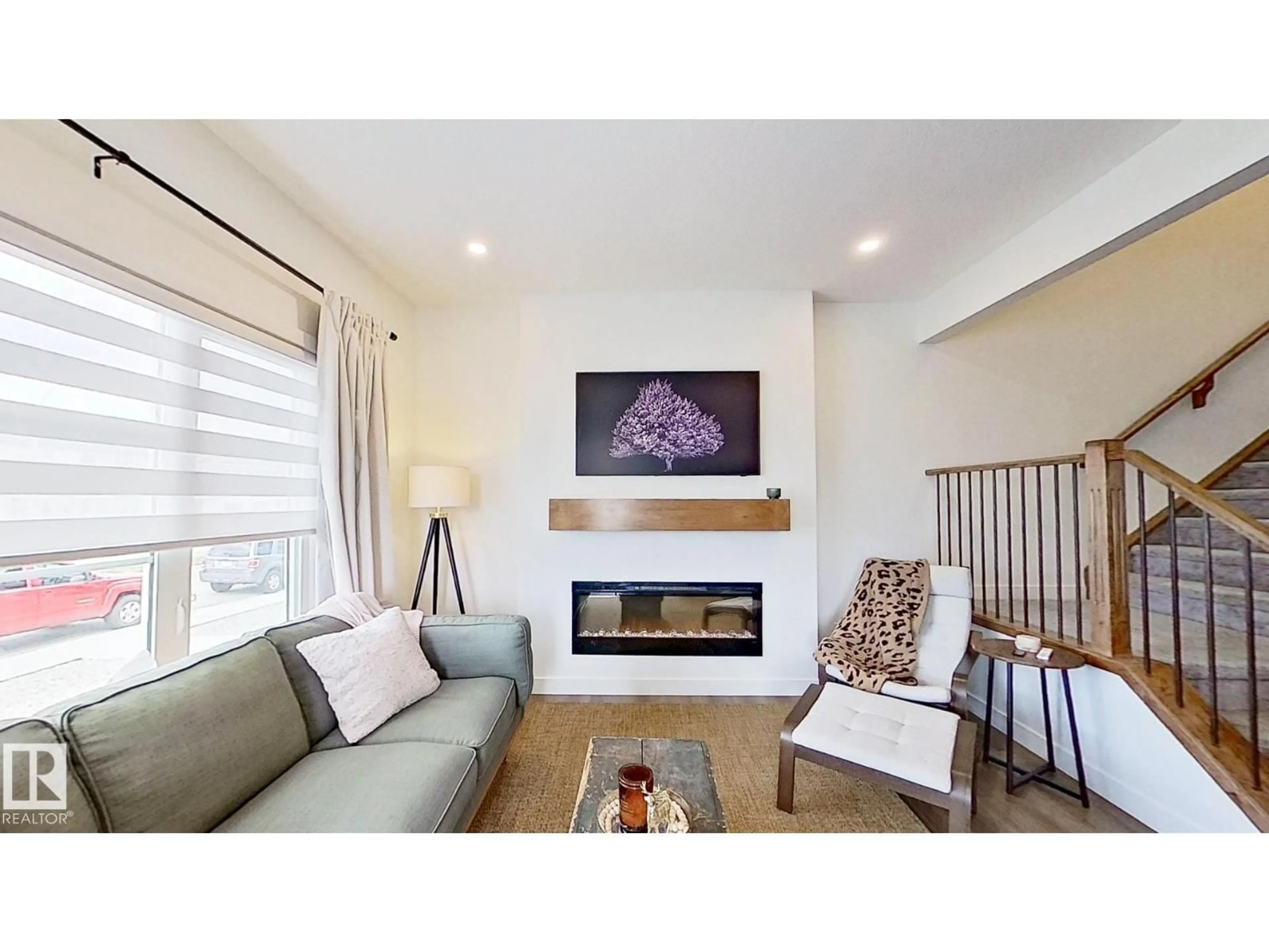 Living room with furniture, unknown for 37 EMBERSIDE LINK, Cochrane Alberta T4C3A8