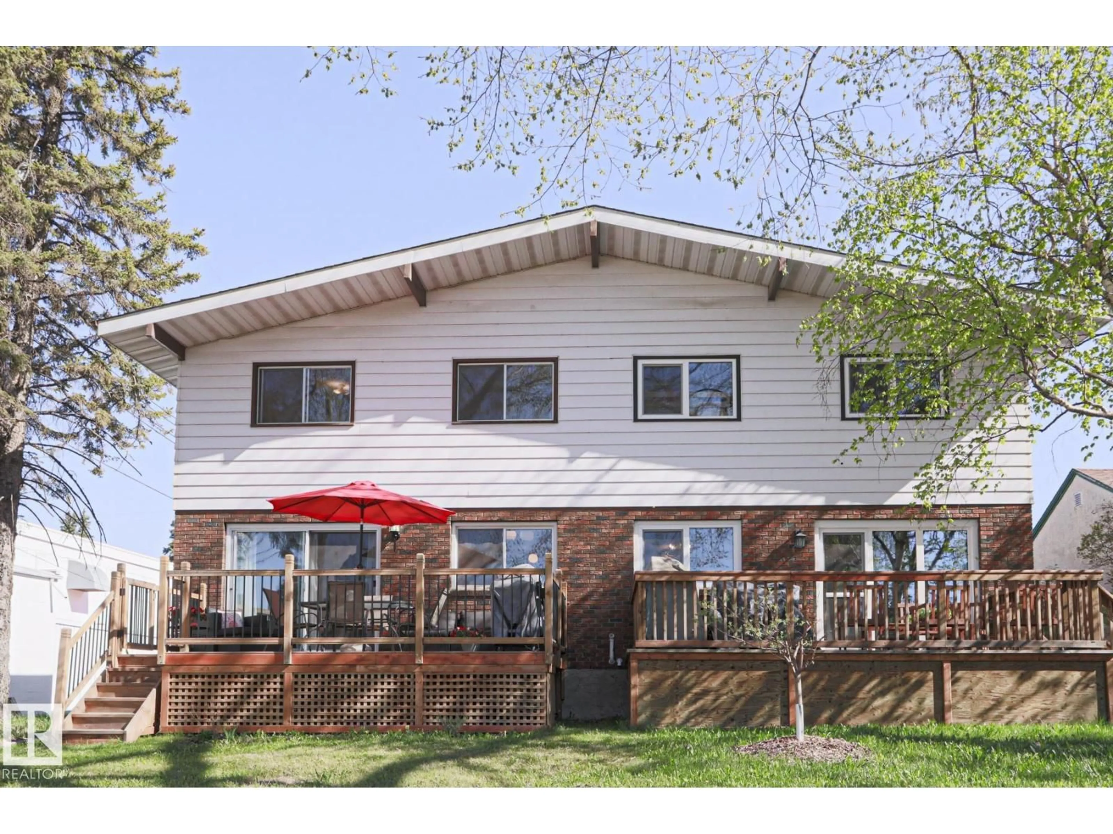 Home with vinyl exterior material, street for NW - 9324 80 AV, Edmonton Alberta T6C0T9