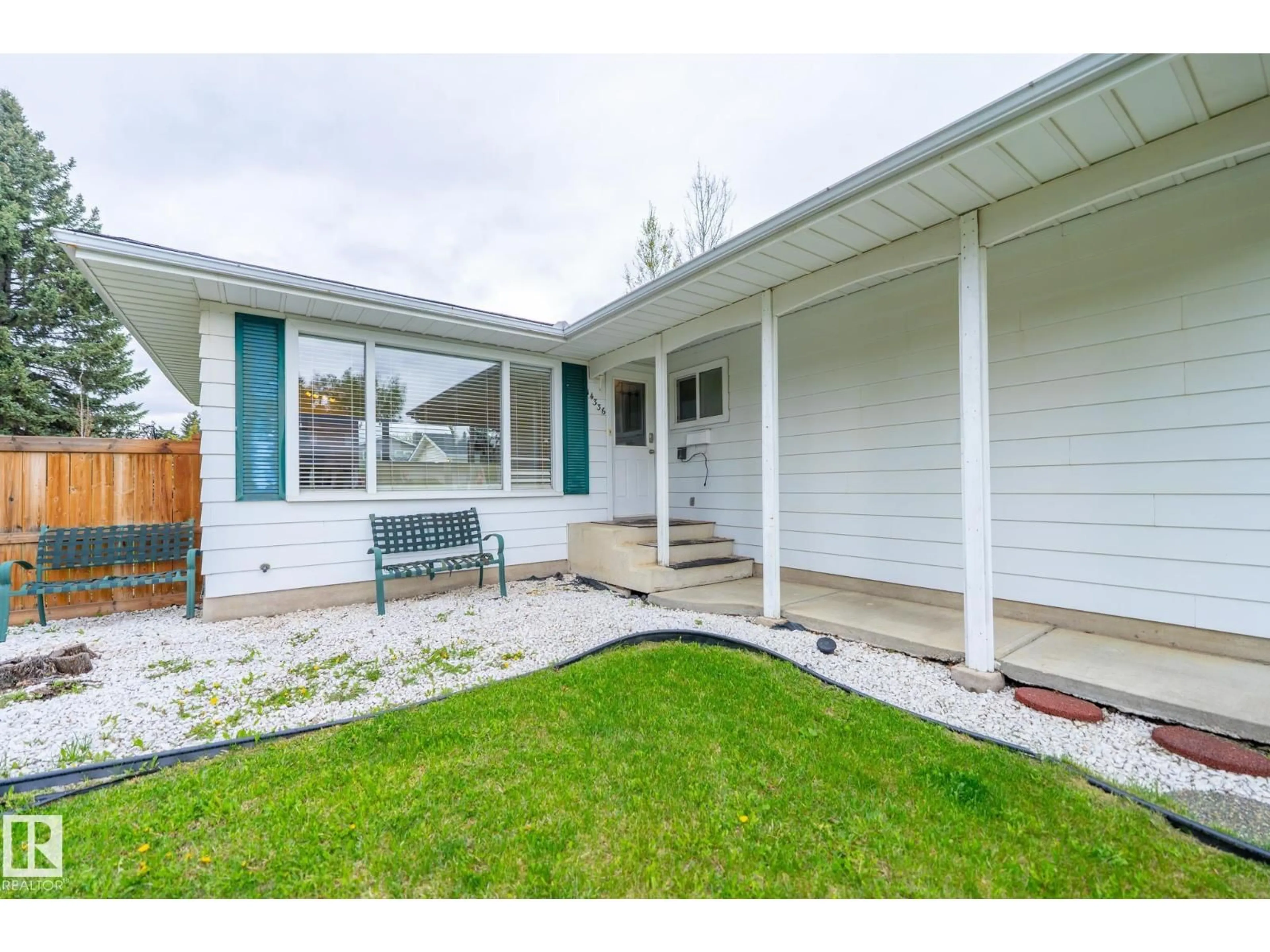 Home with vinyl exterior material, street for NW - 14336 58A AV, Edmonton Alberta T6H1E4