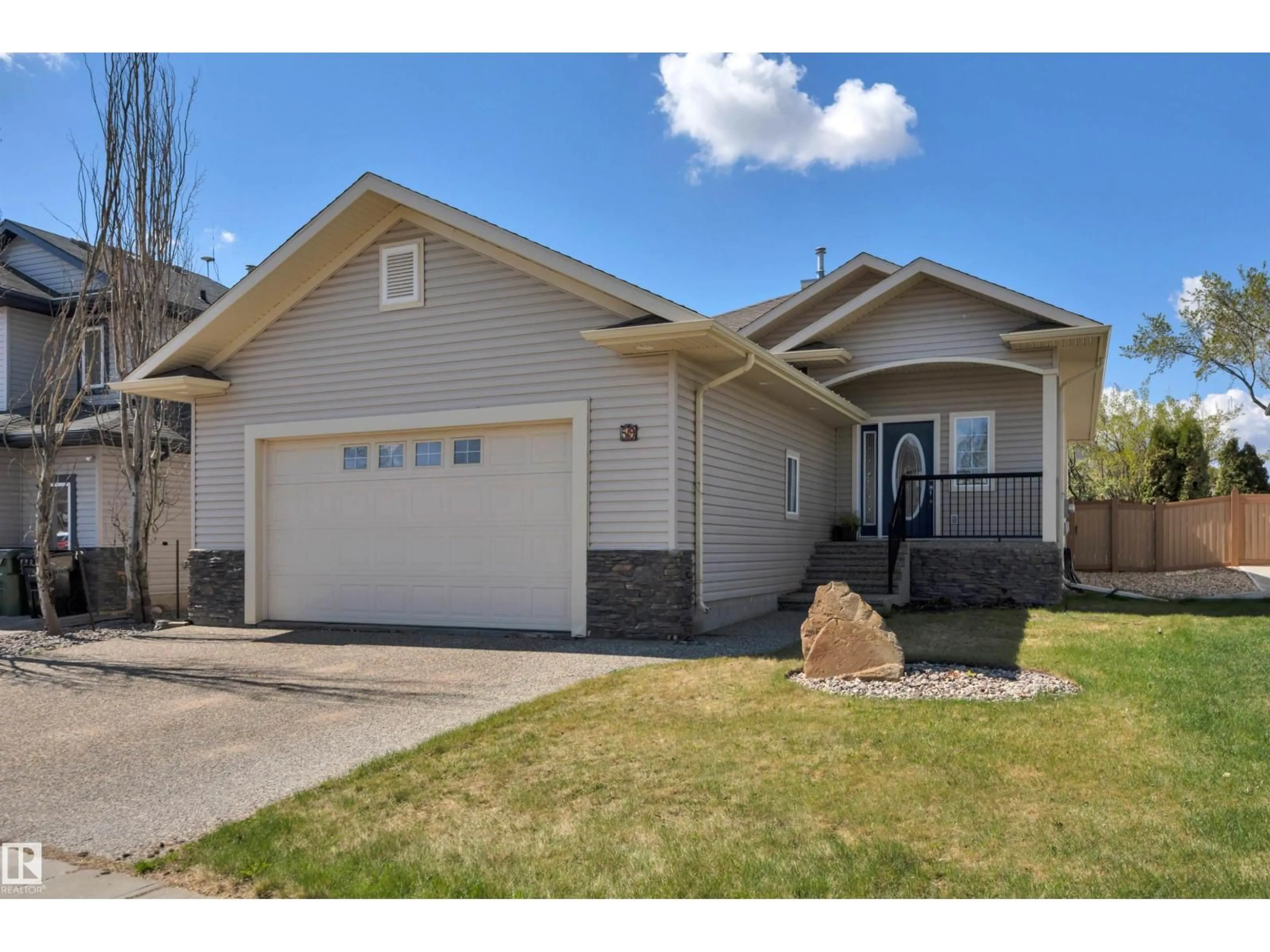 Home with vinyl exterior material, street for 59 WILKINSON PL, Leduc Alberta T9E8N2