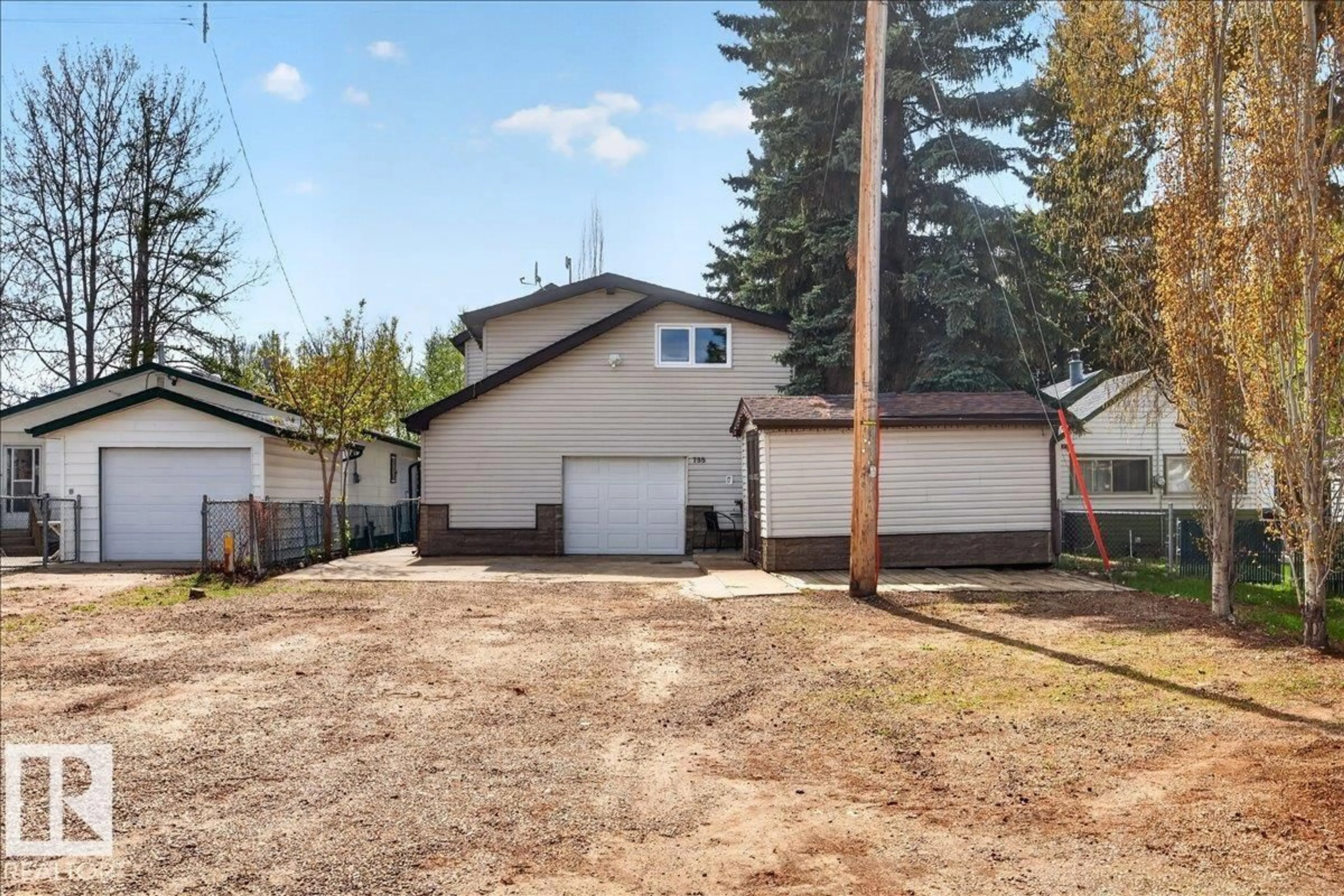 A pic from outside/outdoor area/front of a property/back of a property/a pic from drone, street for 755 LAKESIDE DR, Rural Parkland County Alberta T7Z2V7