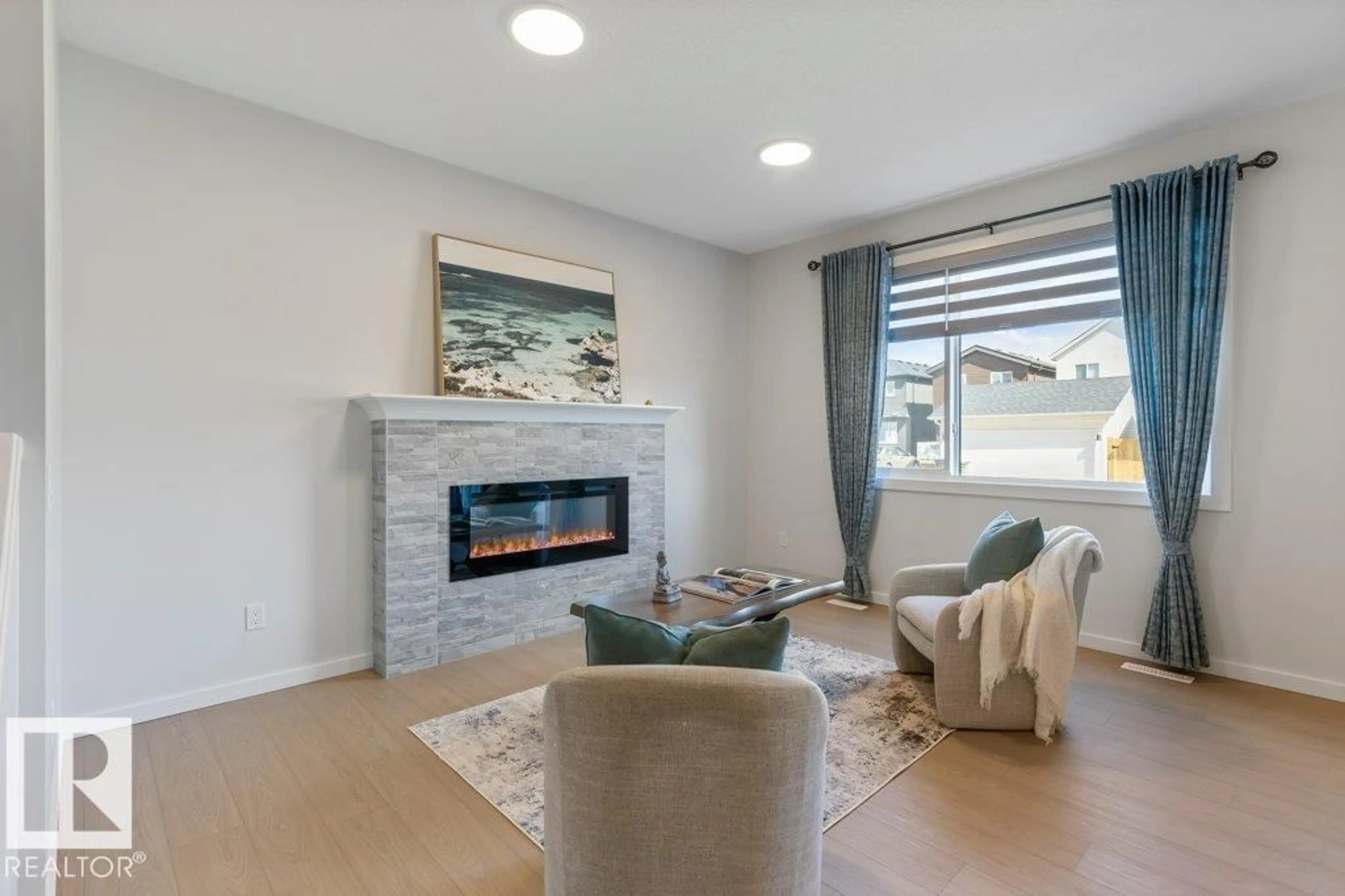 Living room with furniture, unknown for 17339 3 ST, Edmonton Alberta T5Y4G7