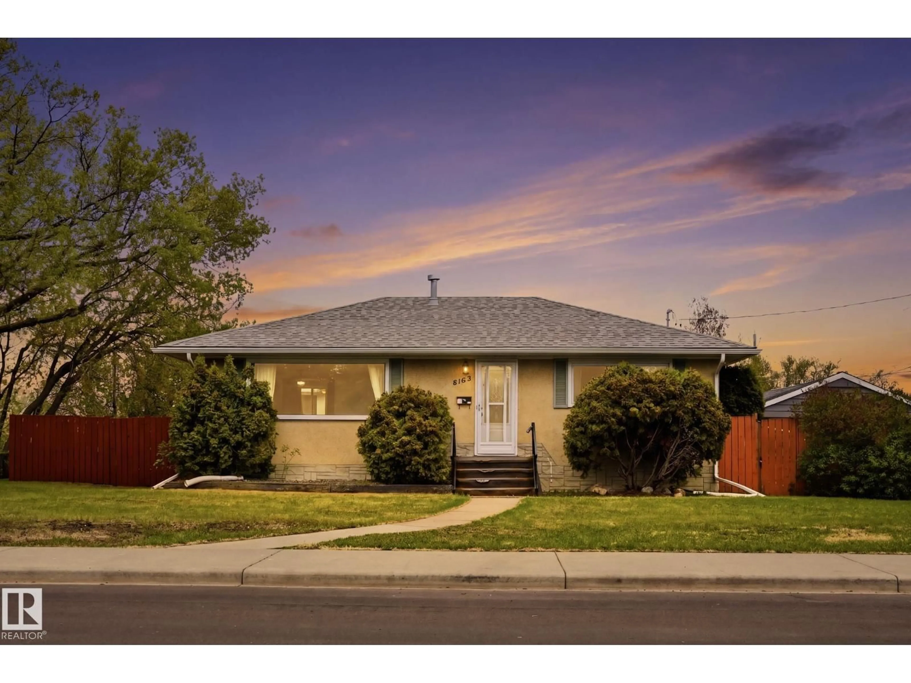 Home with vinyl exterior material, street for 8103 75 AV, Edmonton Alberta T6C0G5
