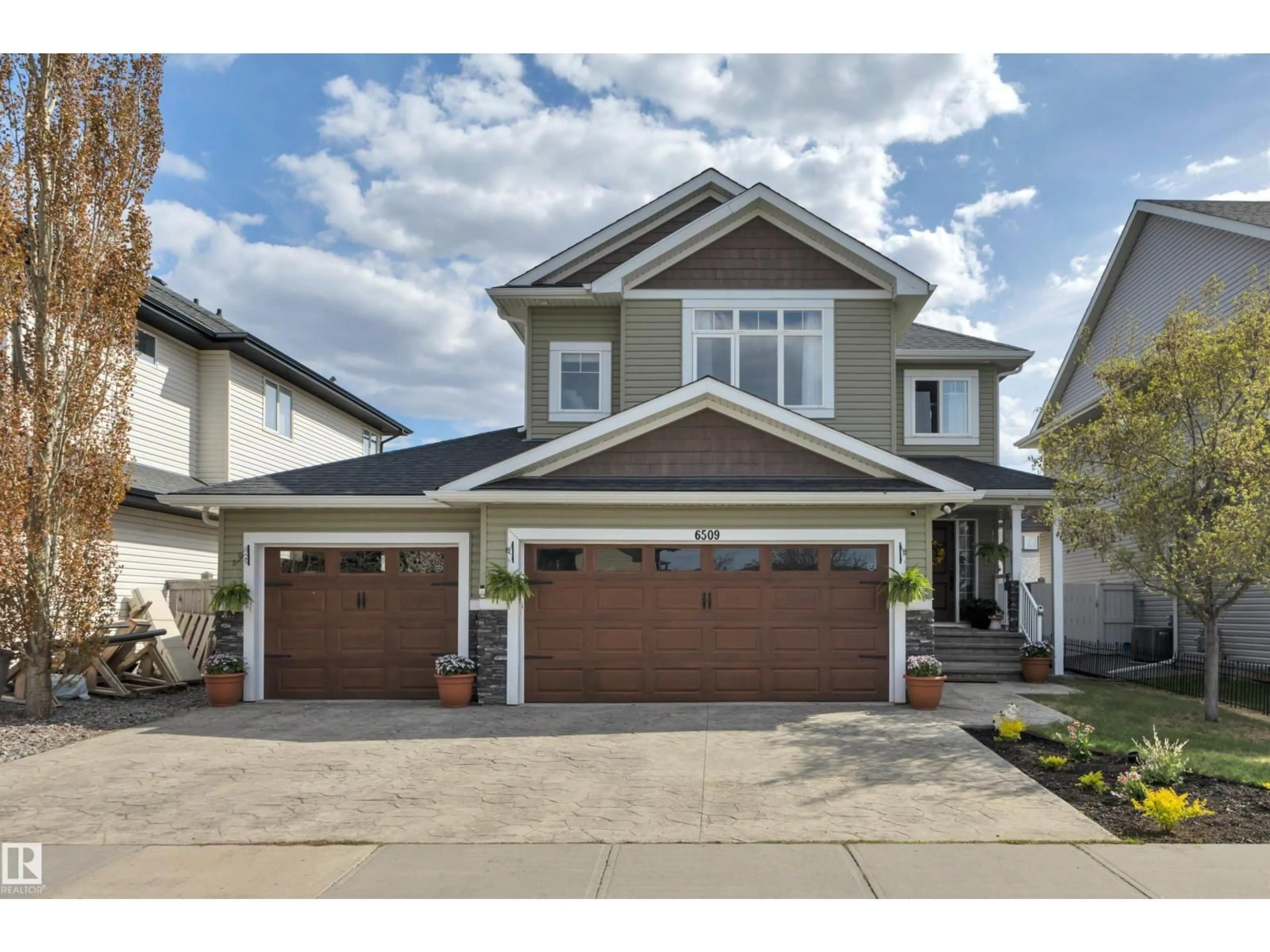 Home with vinyl exterior material, street for 6509 38 AV, Beaumont Alberta T4X0G5