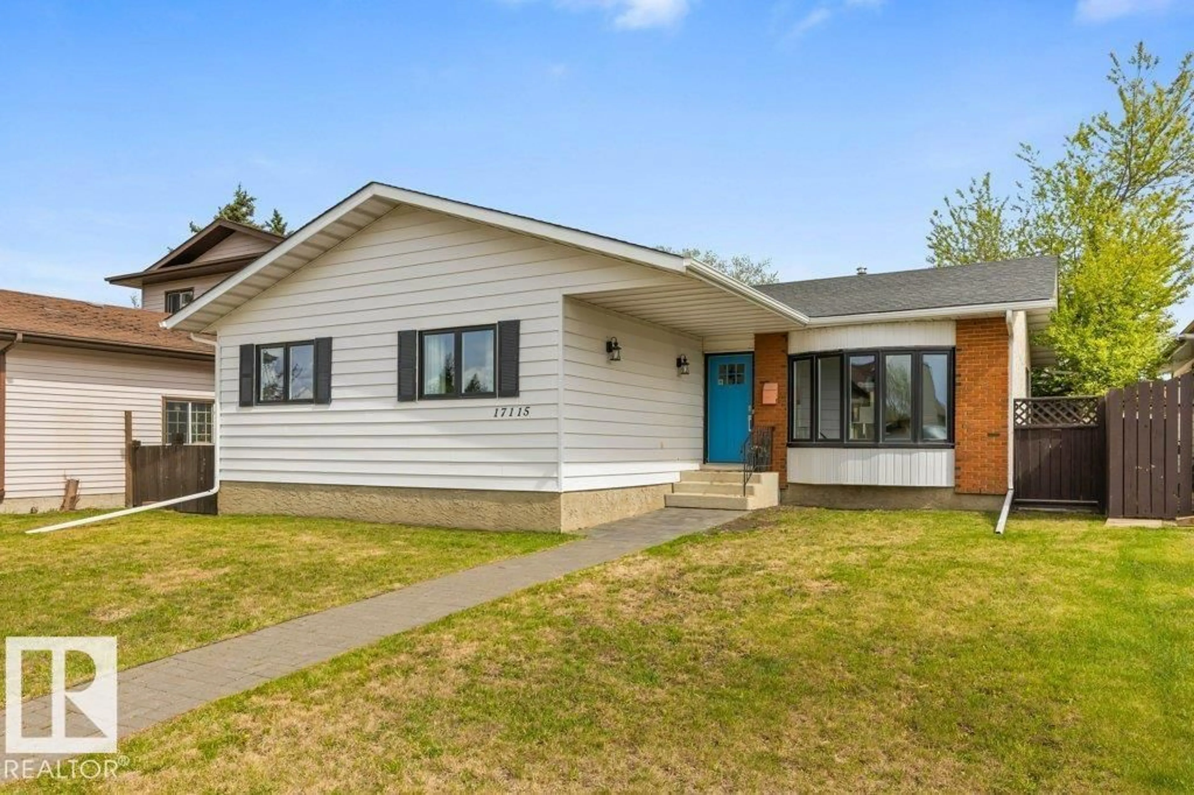 Home with vinyl exterior material, street for 17115 92 ST, Edmonton Alberta T5Z2N1