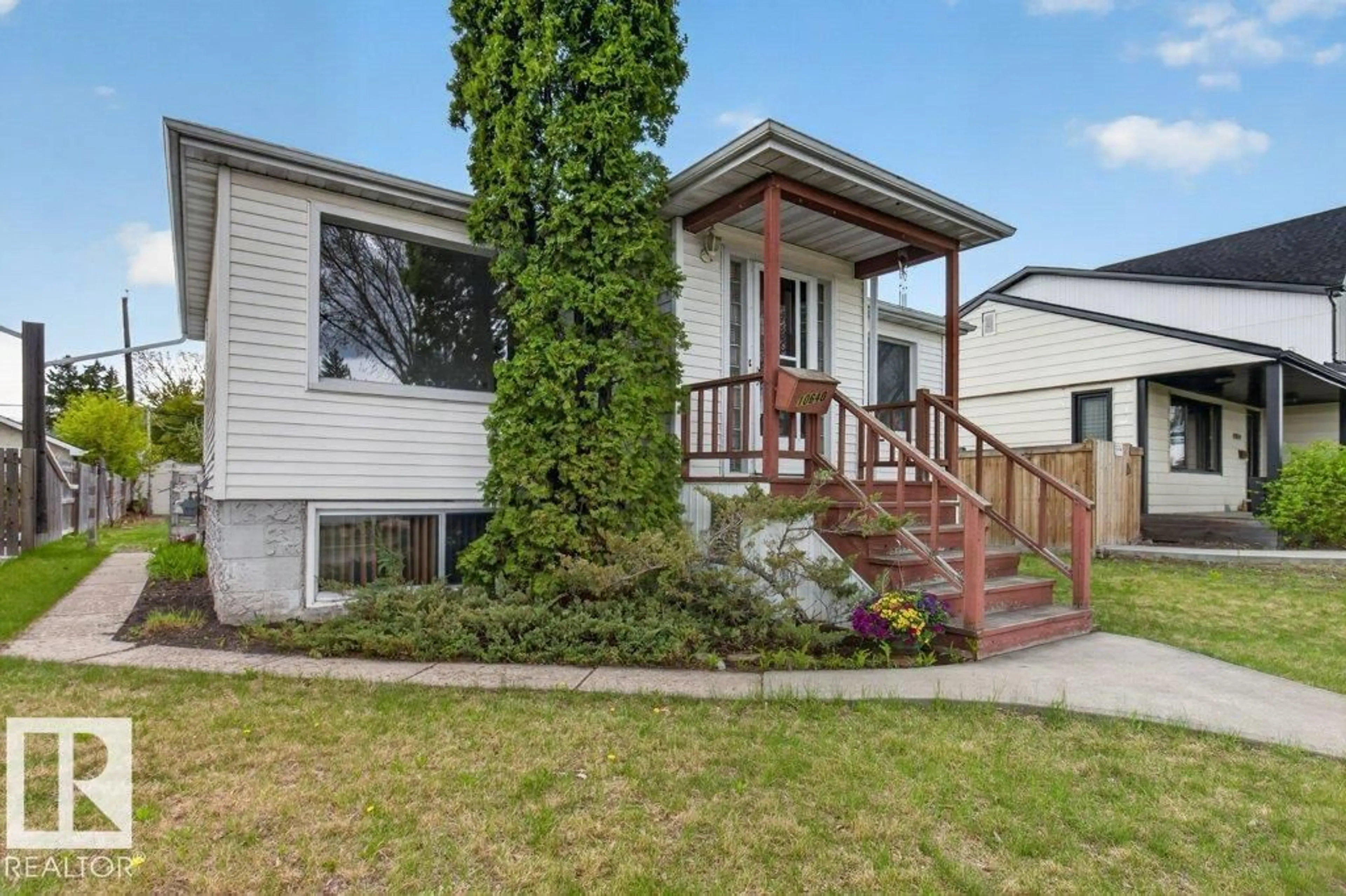 Home with vinyl exterior material, street for NW - 10640 79 ST, Edmonton Alberta T6A3H4