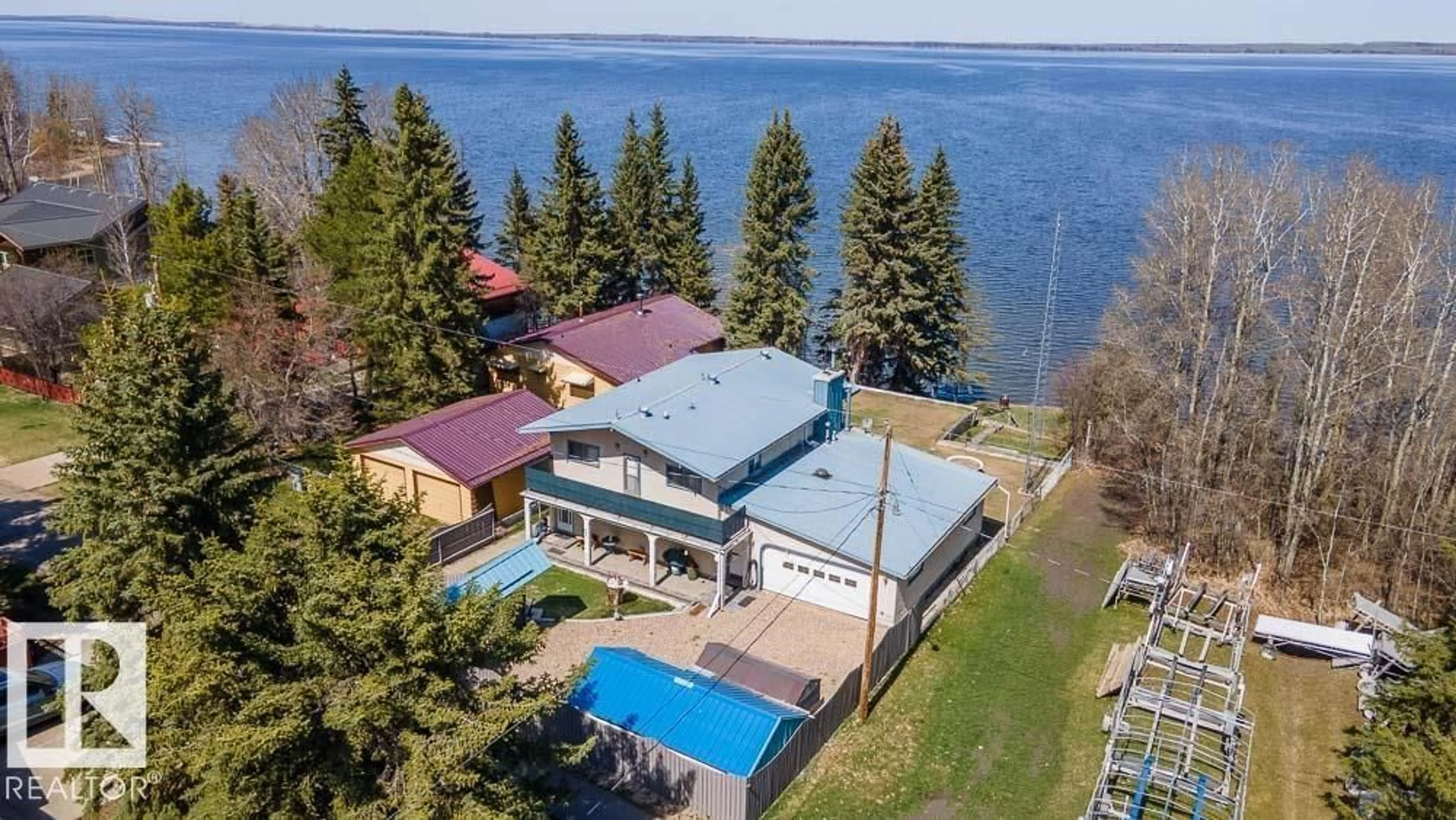 A pic from outside/outdoor area/front of a property/back of a property/a pic from drone, water/lake/river/ocean view for 412 4TH ST, Rural Wetaskiwin County Alberta T0C2V0