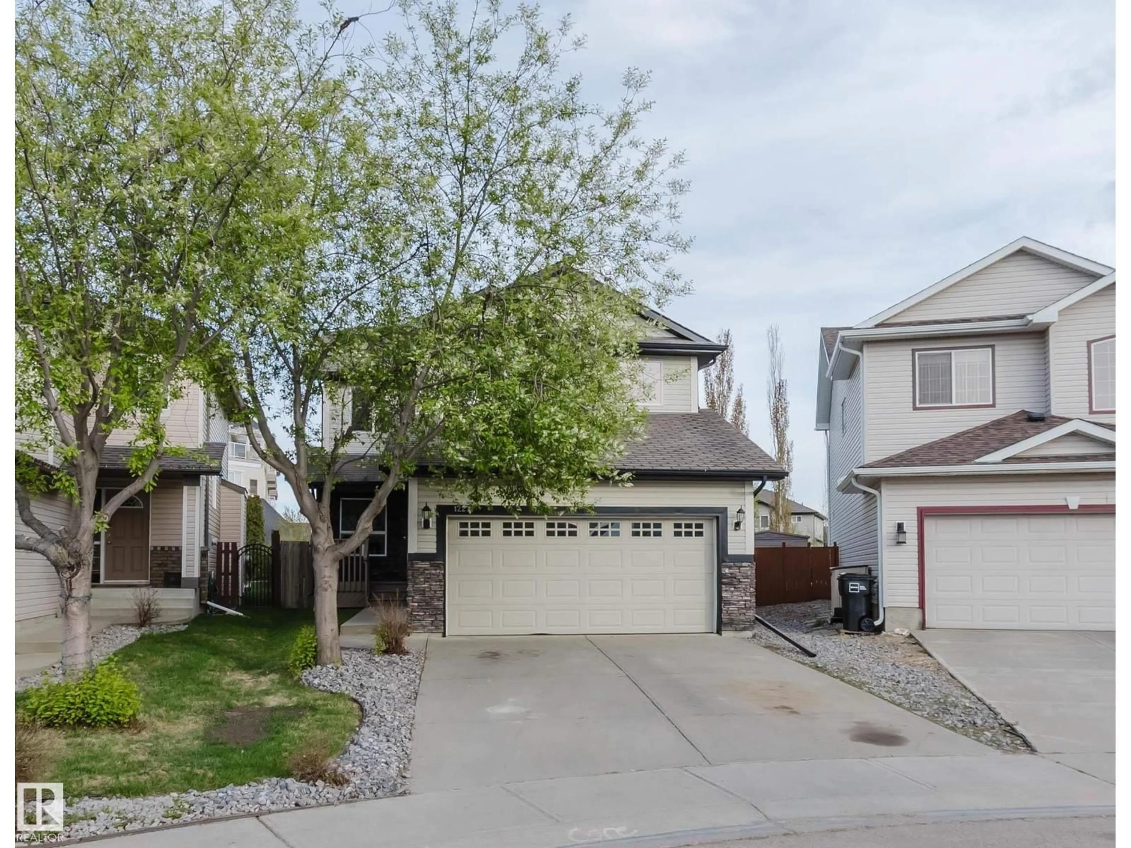 Home with vinyl exterior material, street for SW - 1227 115 ST, Edmonton Alberta T6W1W6