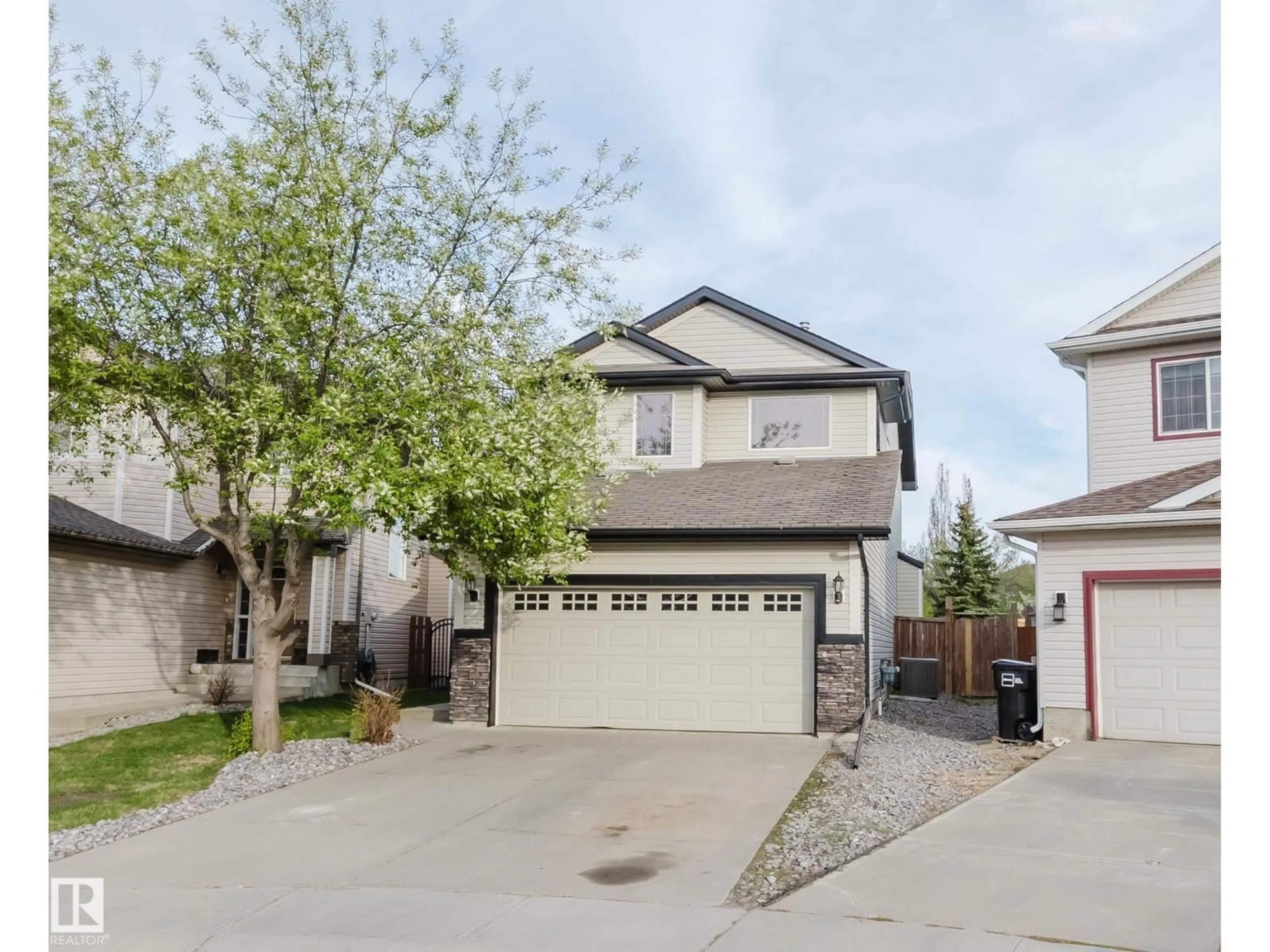 Home with vinyl exterior material, street for SW - 1227 115 ST, Edmonton Alberta T6W1W6