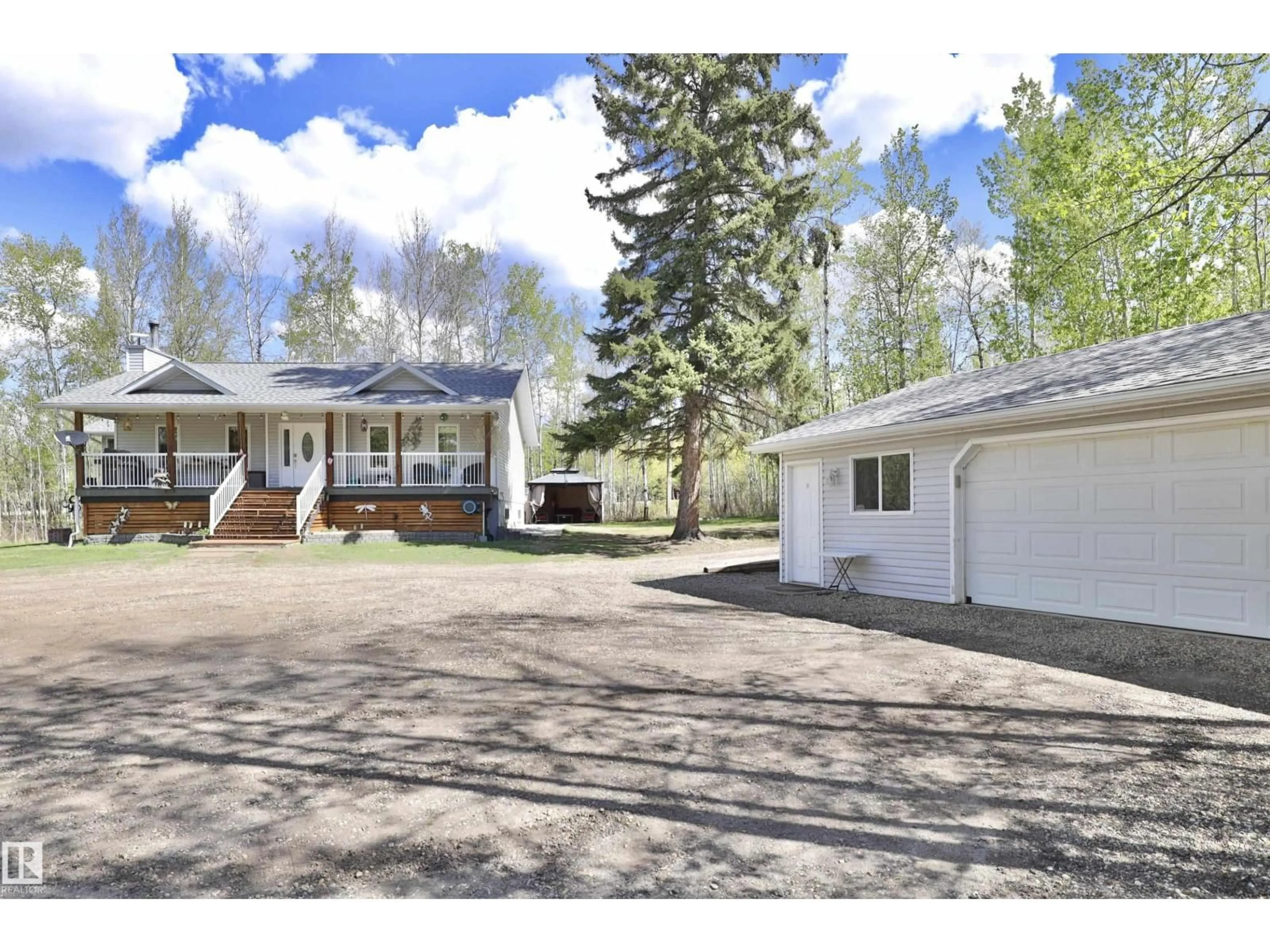 A pic from outside/outdoor area/front of a property/back of a property/a pic from drone, street for 5502 39 ST, Rural Wetaskiwin County Alberta T0C2C0