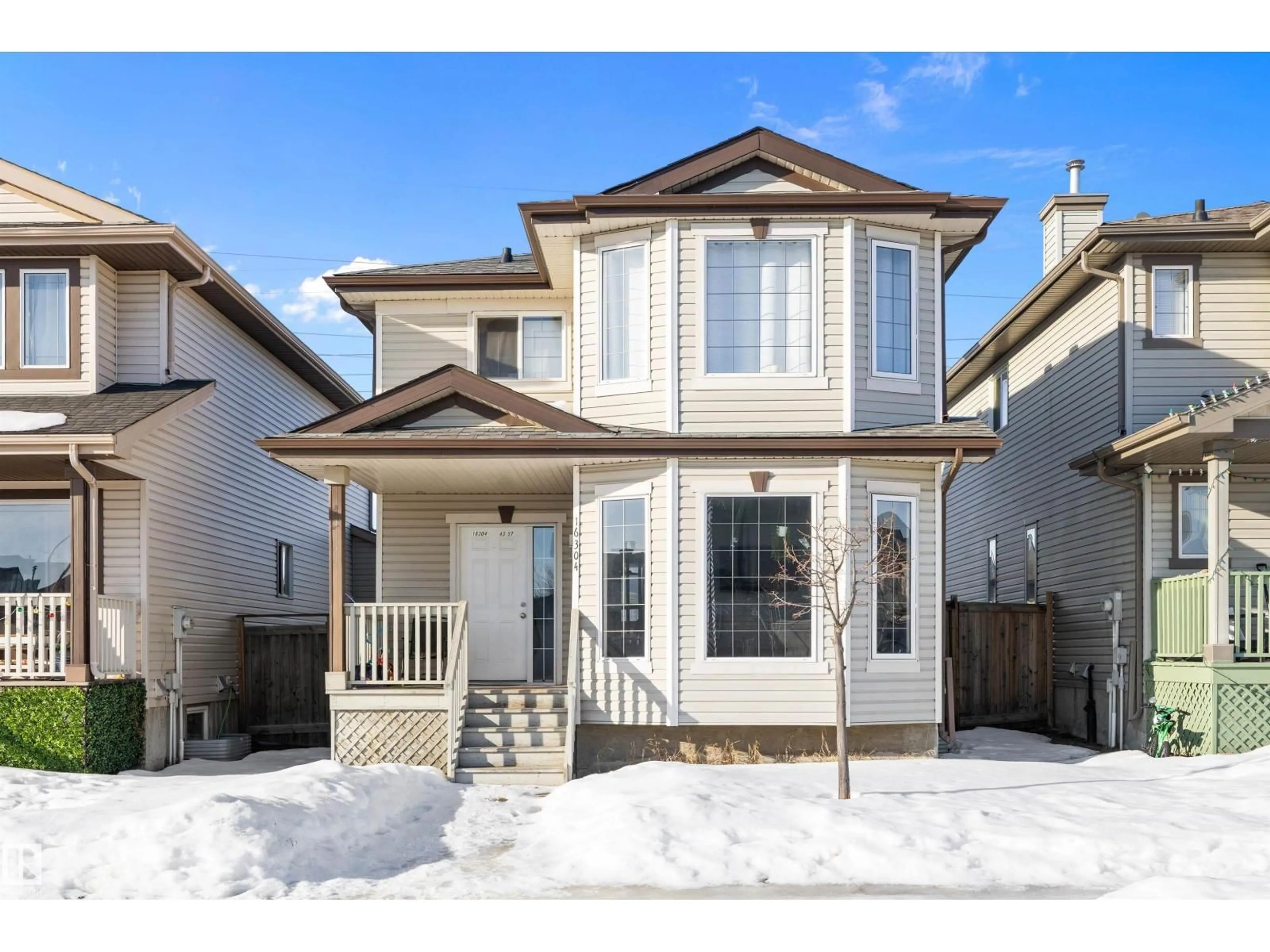 Home with vinyl exterior material, street for NW - 16304 43 ST, Edmonton Alberta T5Y0H8