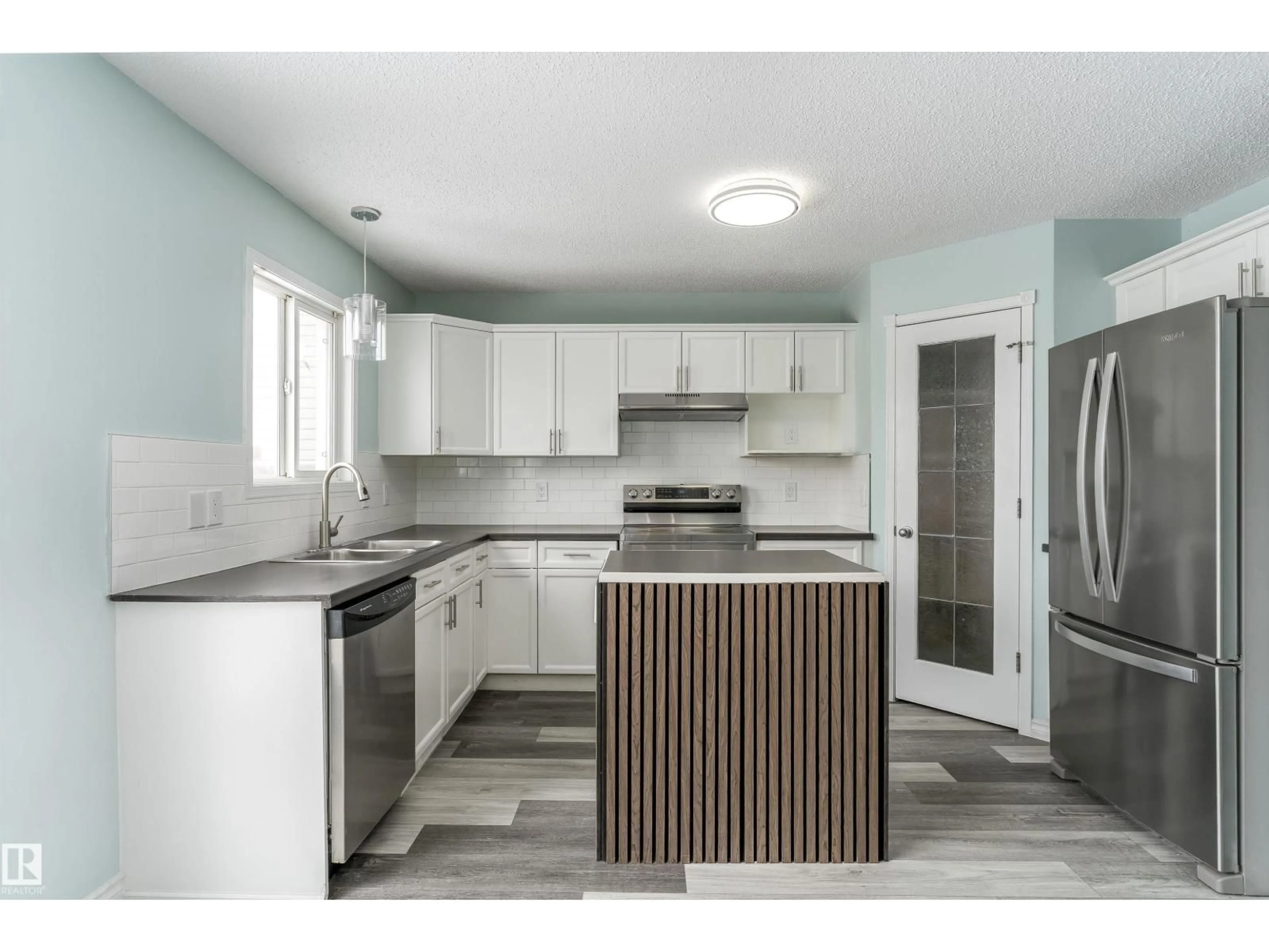 Open concept kitchen, unknown for NW - 16304 43 ST, Edmonton Alberta T5Y0H8