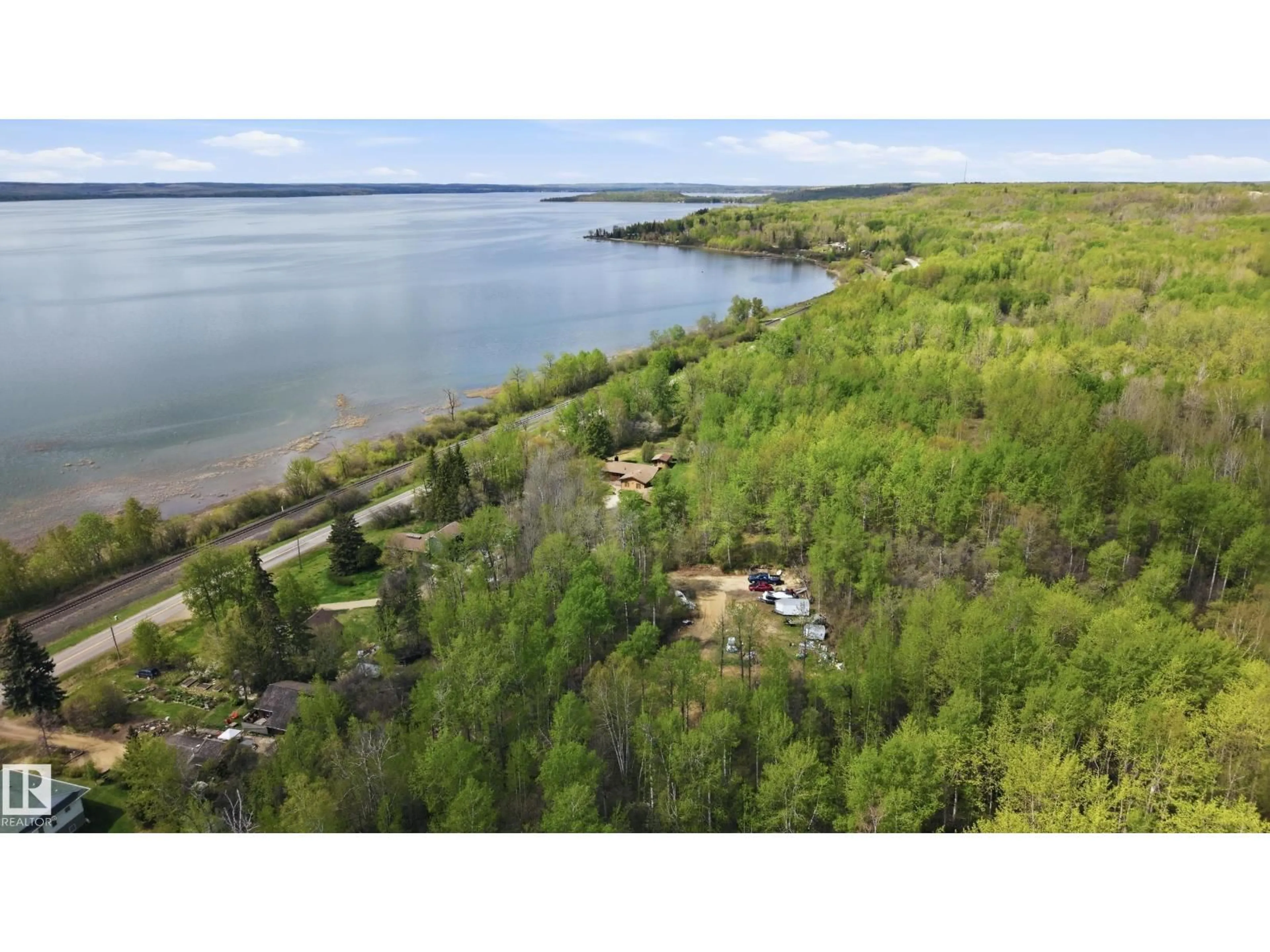 A pic from outside/outdoor area/front of a property/back of a property/a pic from drone, water/lake/river/ocean view for 4502 A LAKESHORE RD, Wabamun Alberta T0E2K0
