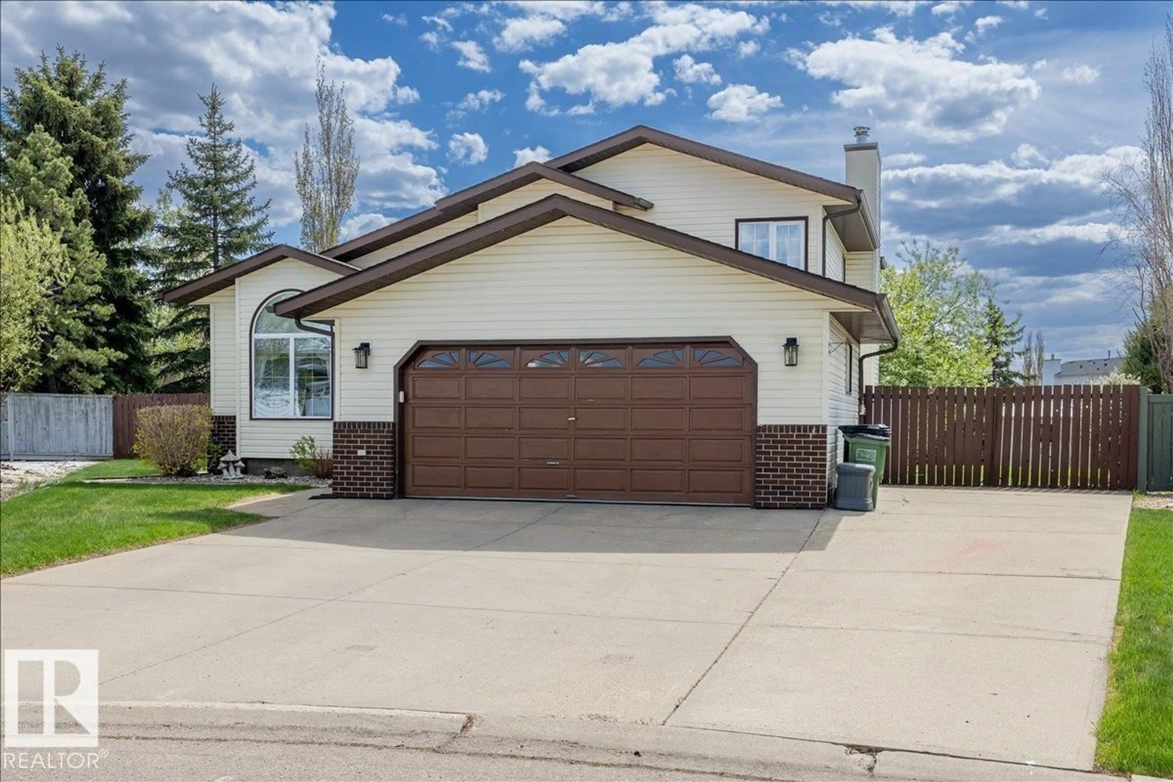Home with vinyl exterior material, street for NW - 5611 152B AV, Edmonton Alberta T5A4X8