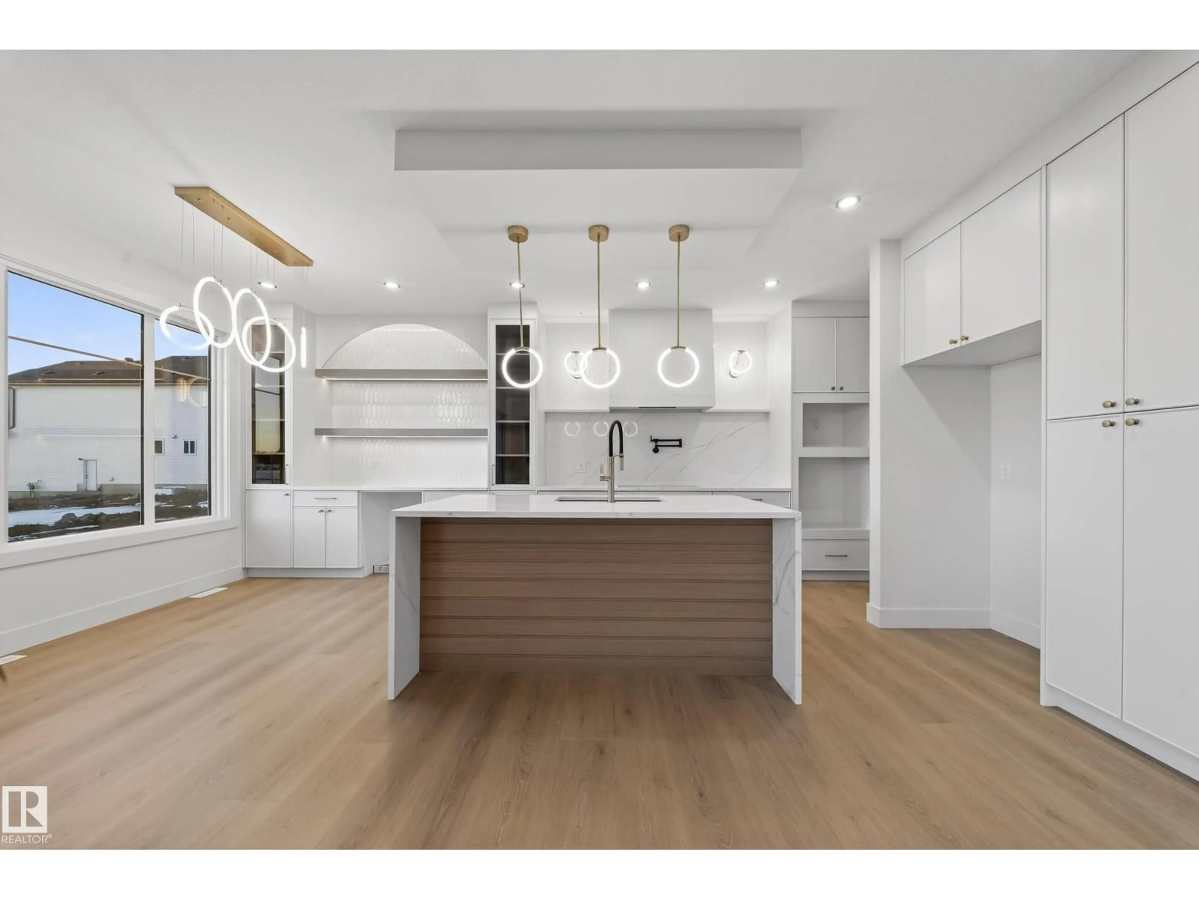 Open concept kitchen, wood/laminate floor for 4276 CHARLES CL, Edmonton Alberta T6W1A7