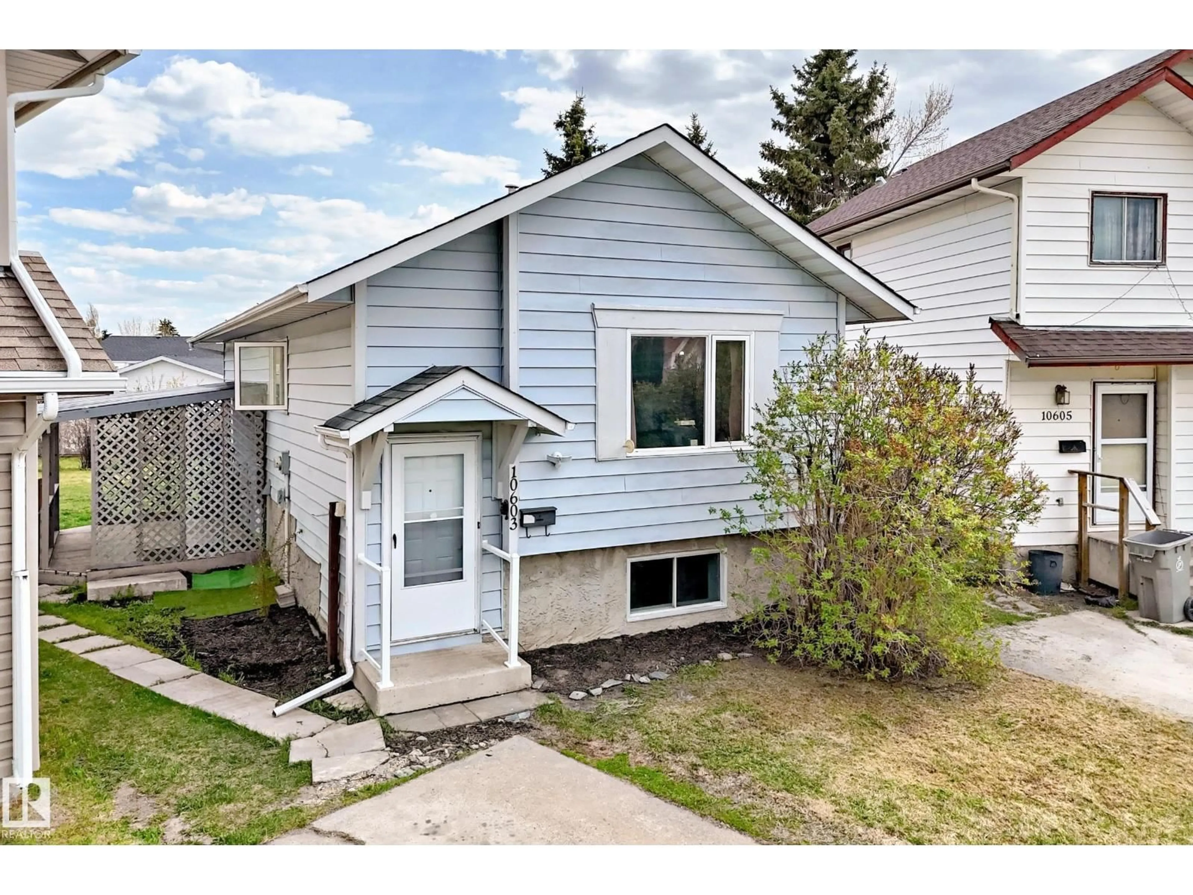 Home with vinyl exterior material, street for 10603 98 AV, Morinville Alberta T8R1E4