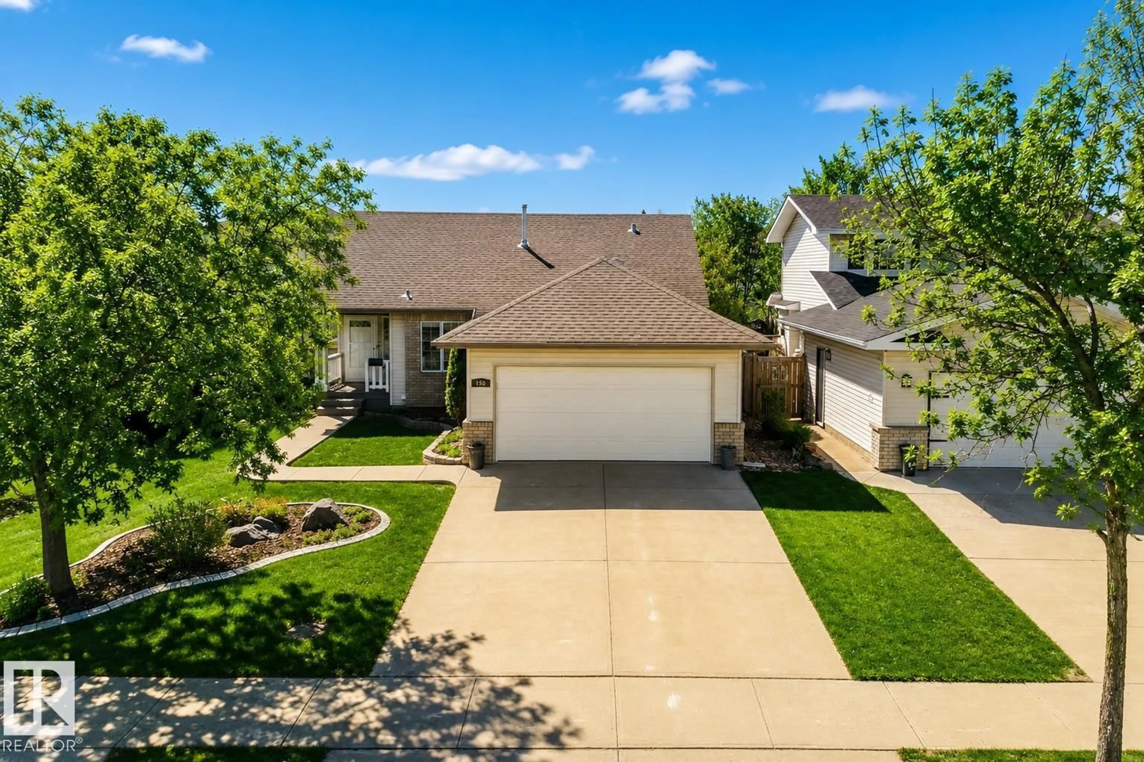 A pic from outside/outdoor area/front of a property/back of a property/a pic from drone, street for 150 DEER RIDGE DR, St. Albert Alberta T8N6G9