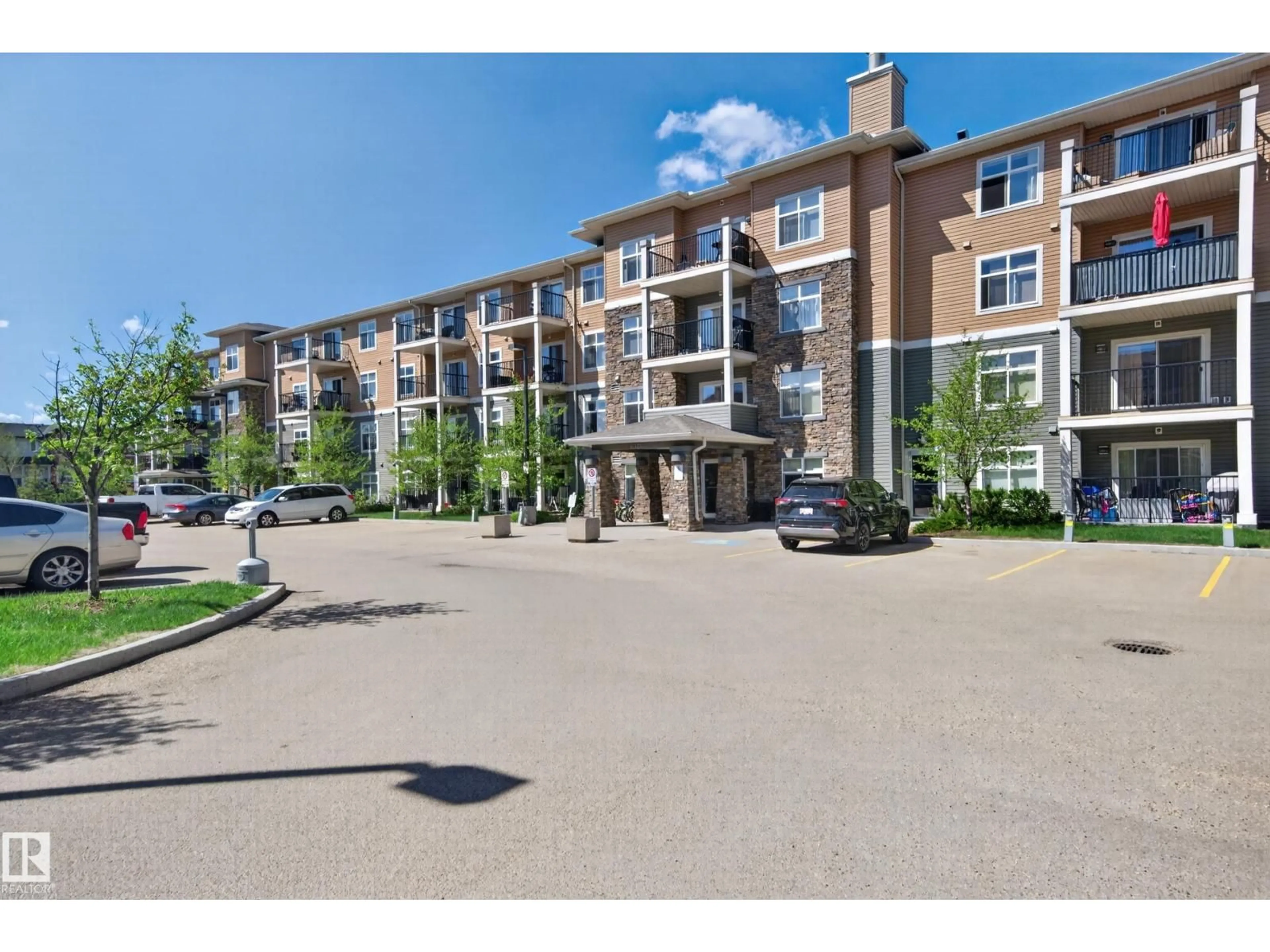A pic from outside/outdoor area/front of a property/back of a property/a pic from drone, unknown for 6076 - 340 SCHONSEE WY, Edmonton Alberta T5Z0K8