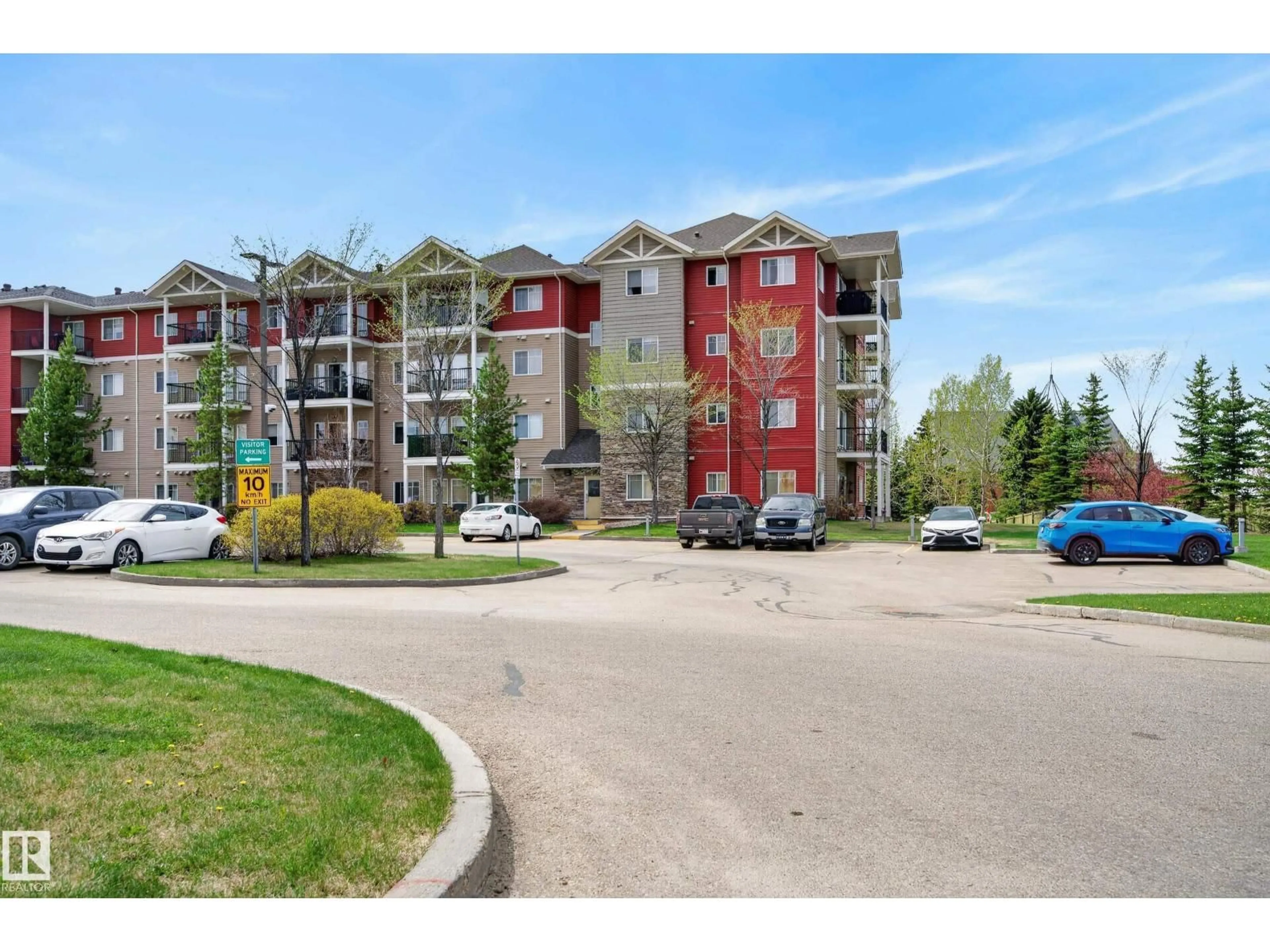 A pic from outside/outdoor area/front of a property/back of a property/a pic from drone, street for #102 - 273 CHARLOTTE WY, Sherwood Park Alberta T8H0N9