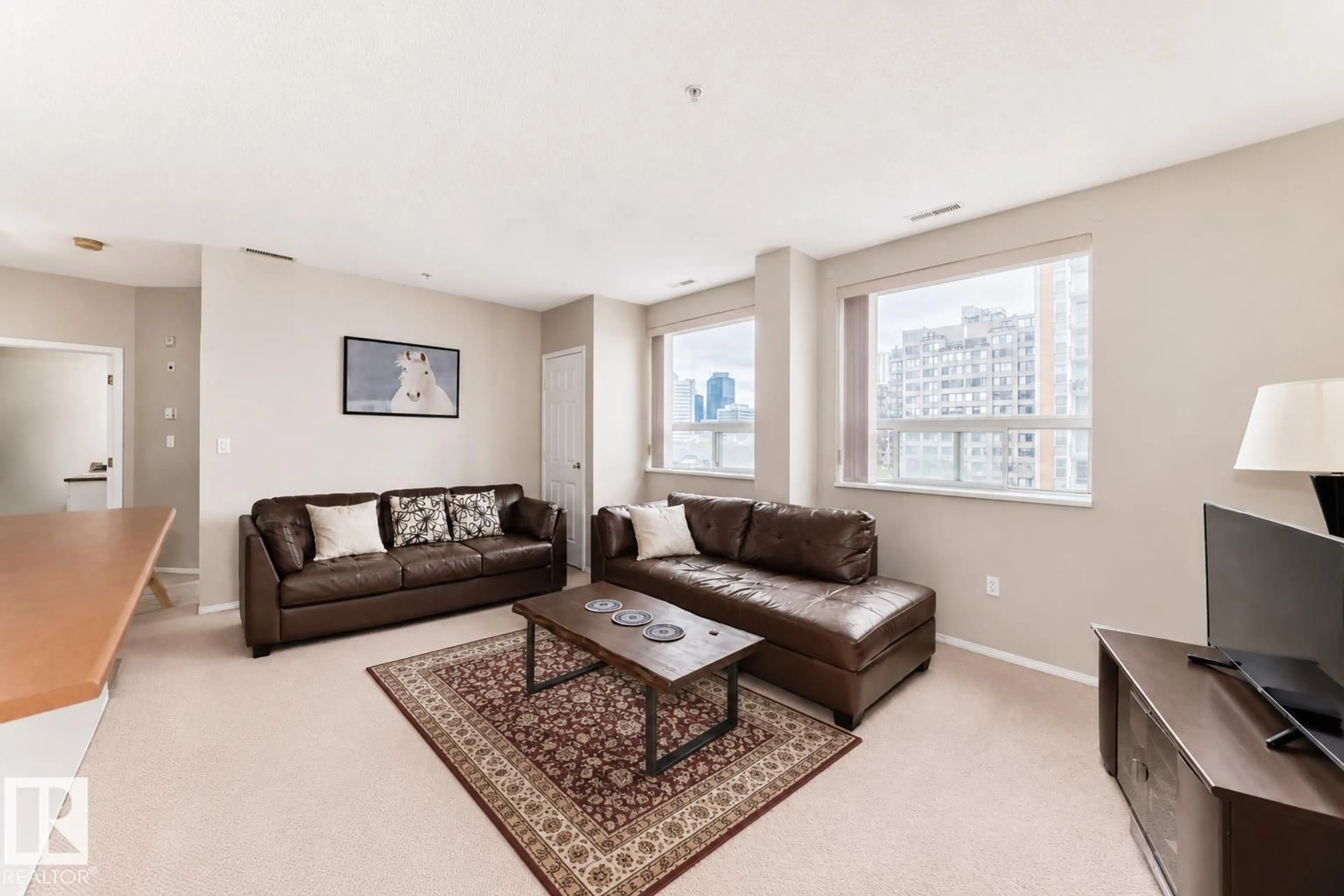 Living room with furniture, carpet floor for 601 9919 105 ST NW, Edmonton Alberta T5K1B1