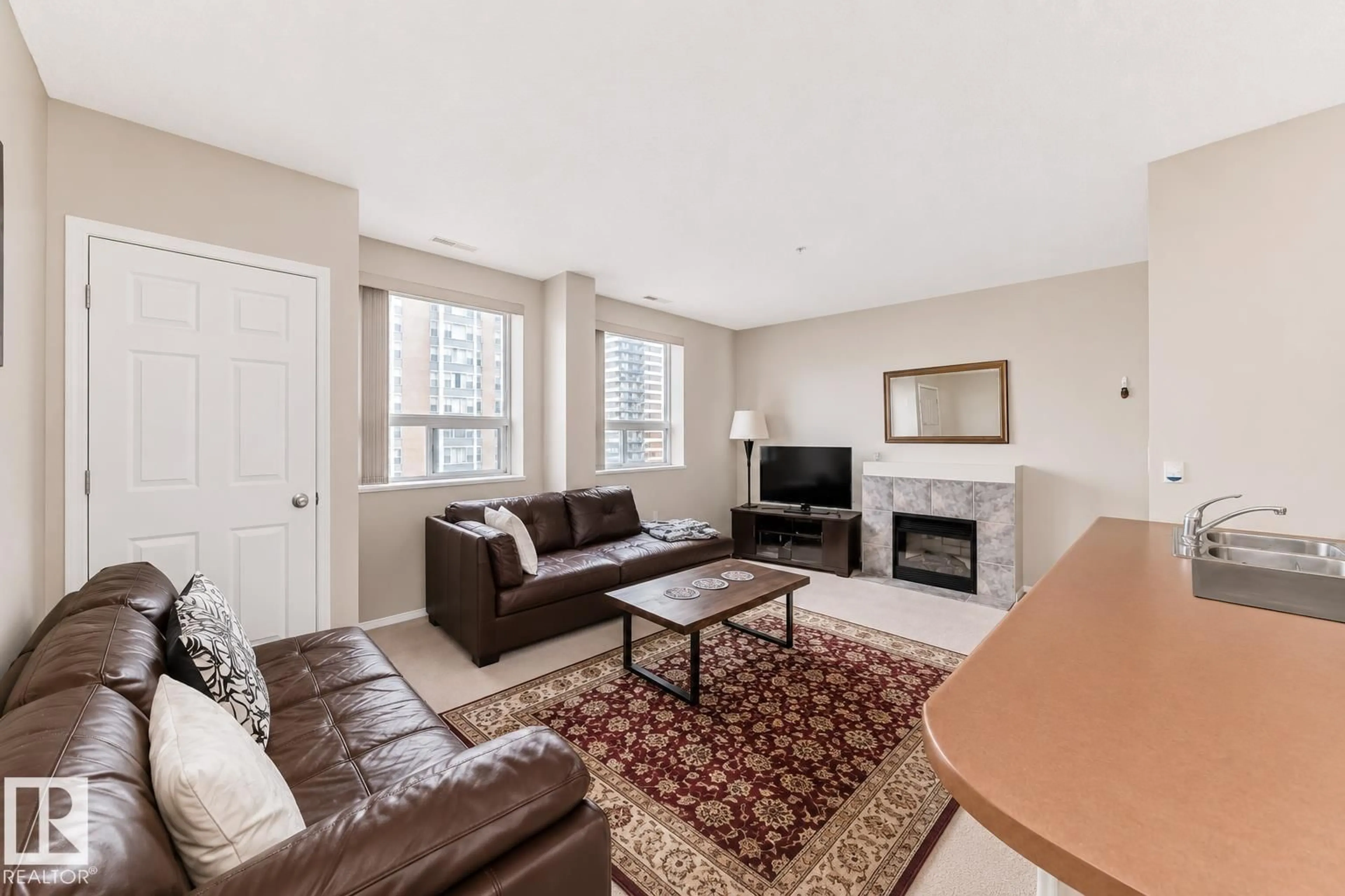 Living room with furniture, unknown for 601 9919 105 ST NW, Edmonton Alberta T5K1B1