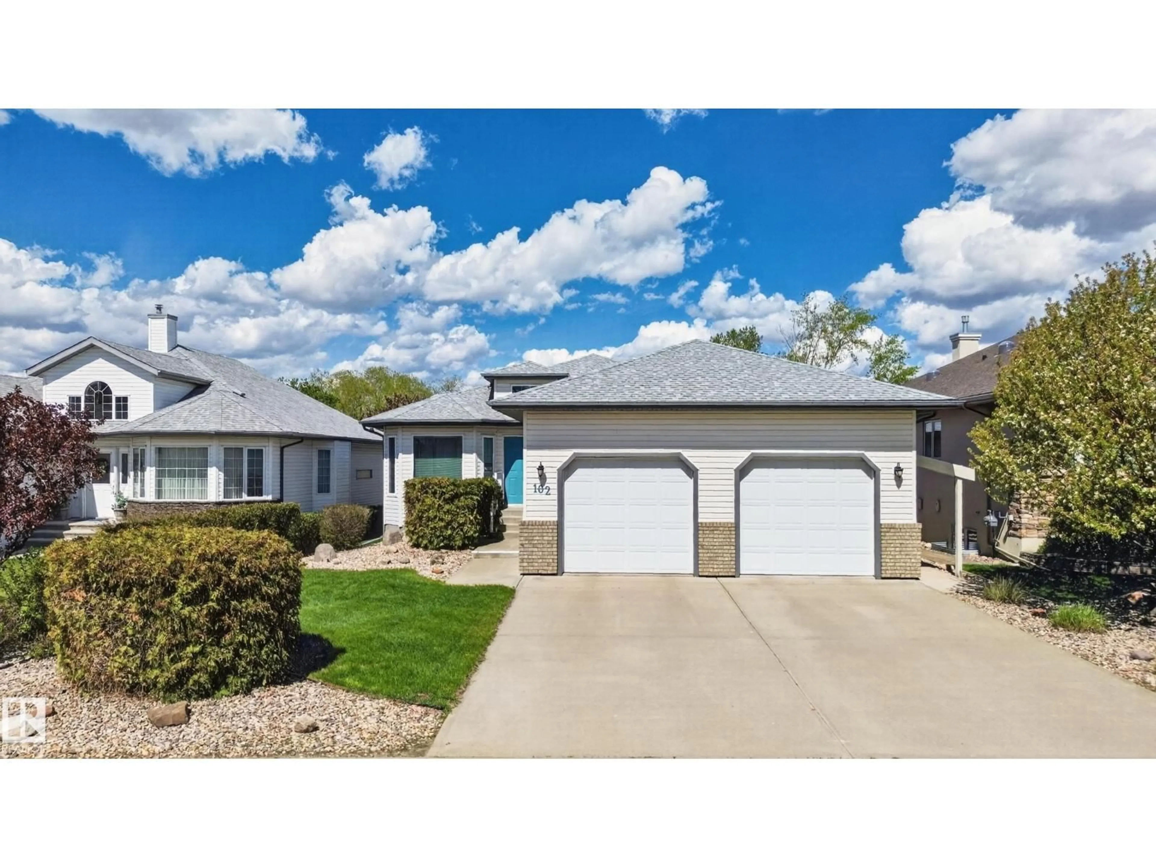Home with vinyl exterior material, street for 102 BRIDGEVIEW DR, Fort Saskatchewan Alberta T8L4J4