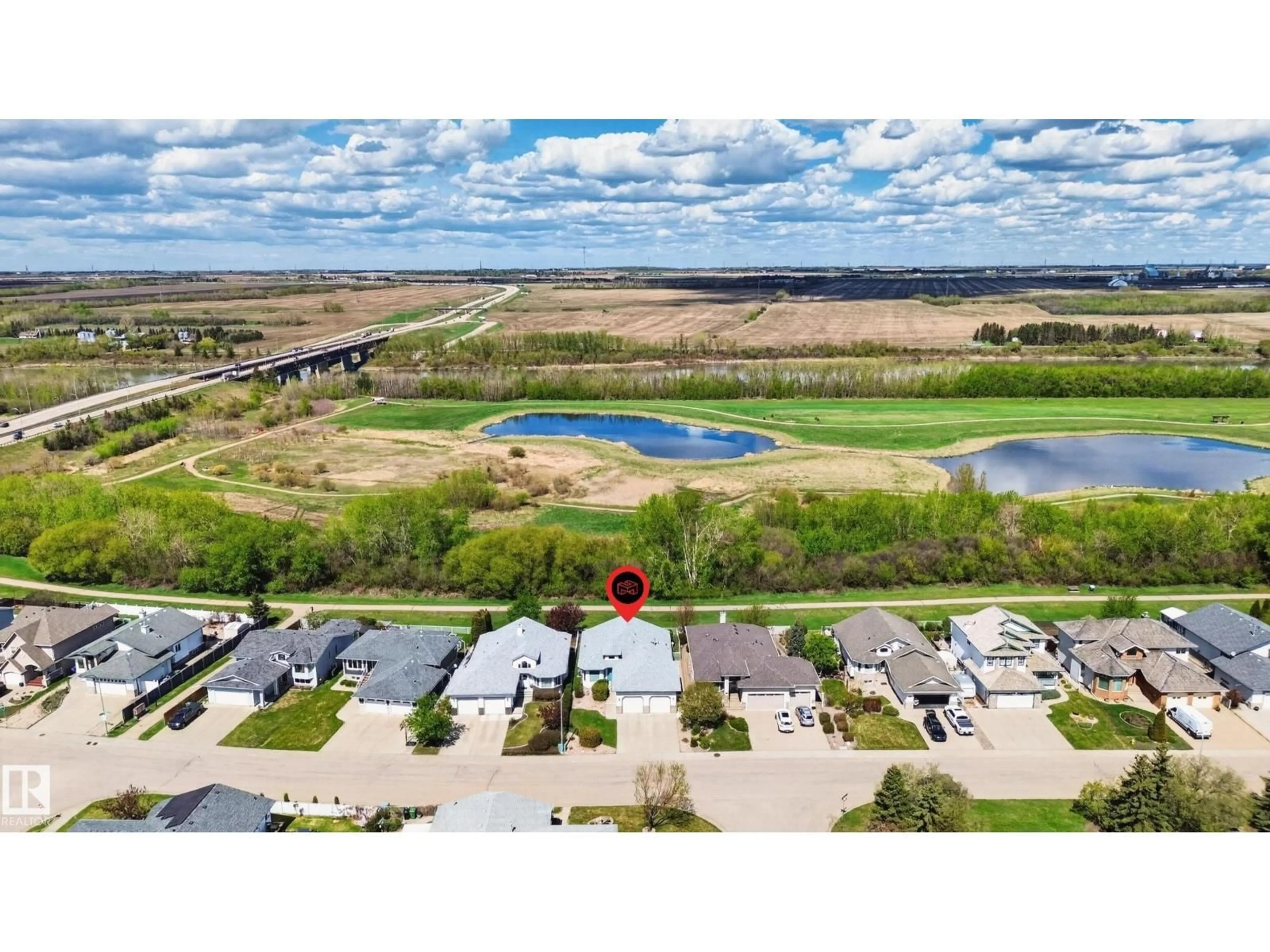 A pic from outside/outdoor area/front of a property/back of a property/a pic from drone, water/lake/river/ocean view for 102 BRIDGEVIEW DR, Fort Saskatchewan Alberta T8L4J4
