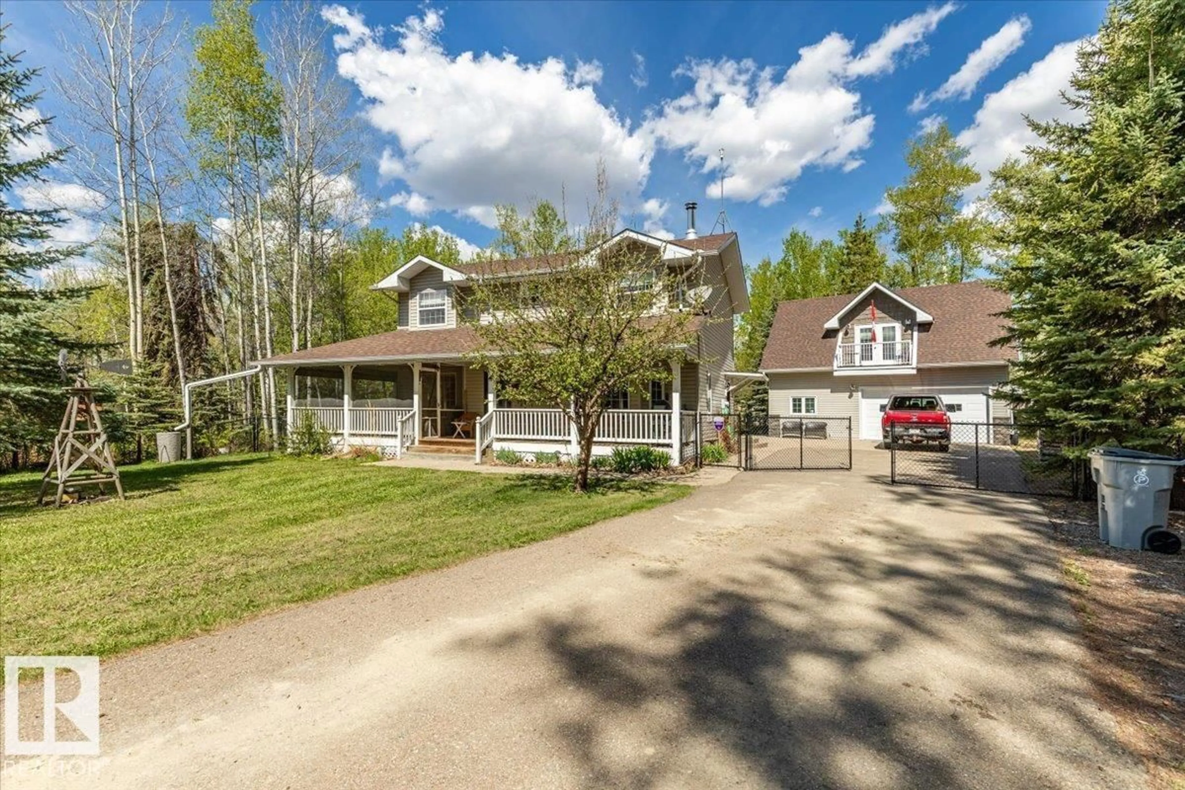A pic from outside/outdoor area/front of a property/back of a property/a pic from drone, street for B59 COTTAGE CR, Rural Leduc County Alberta T0C2C0