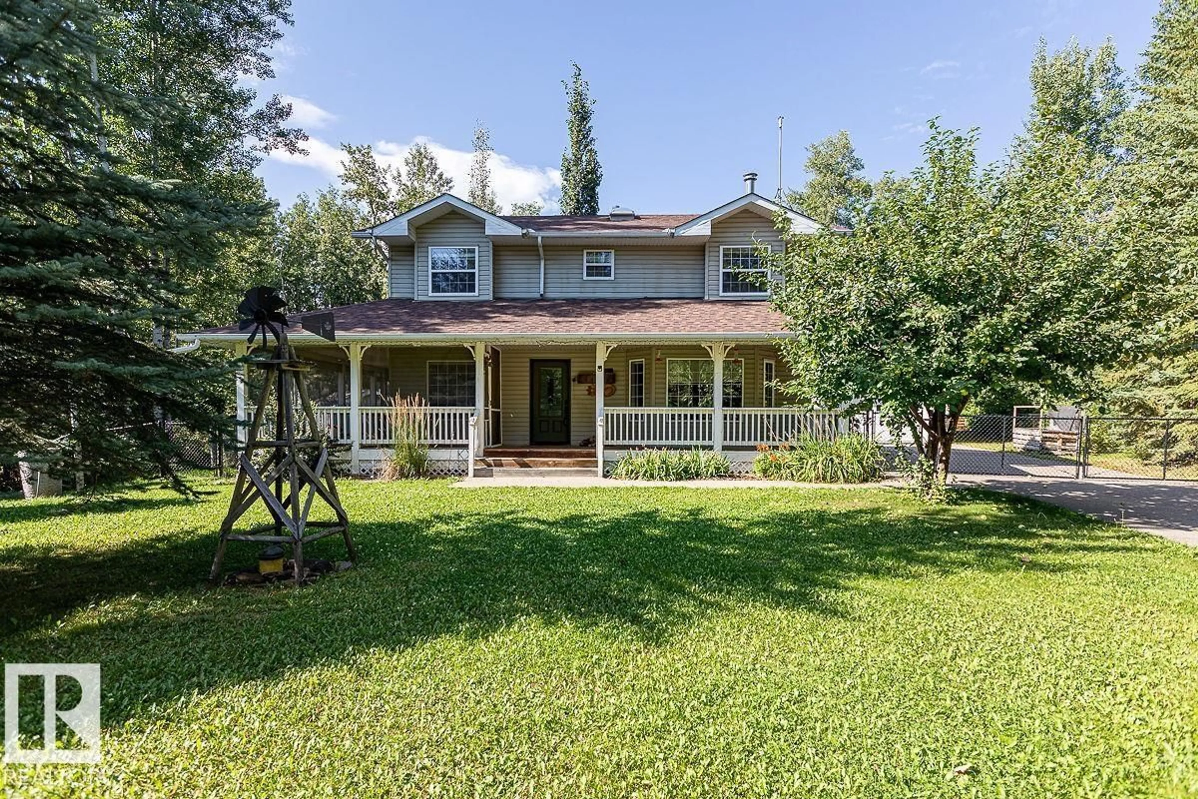 A pic from outside/outdoor area/front of a property/back of a property/a pic from drone, unknown for B59 COTTAGE CR, Rural Leduc County Alberta T0C2C0