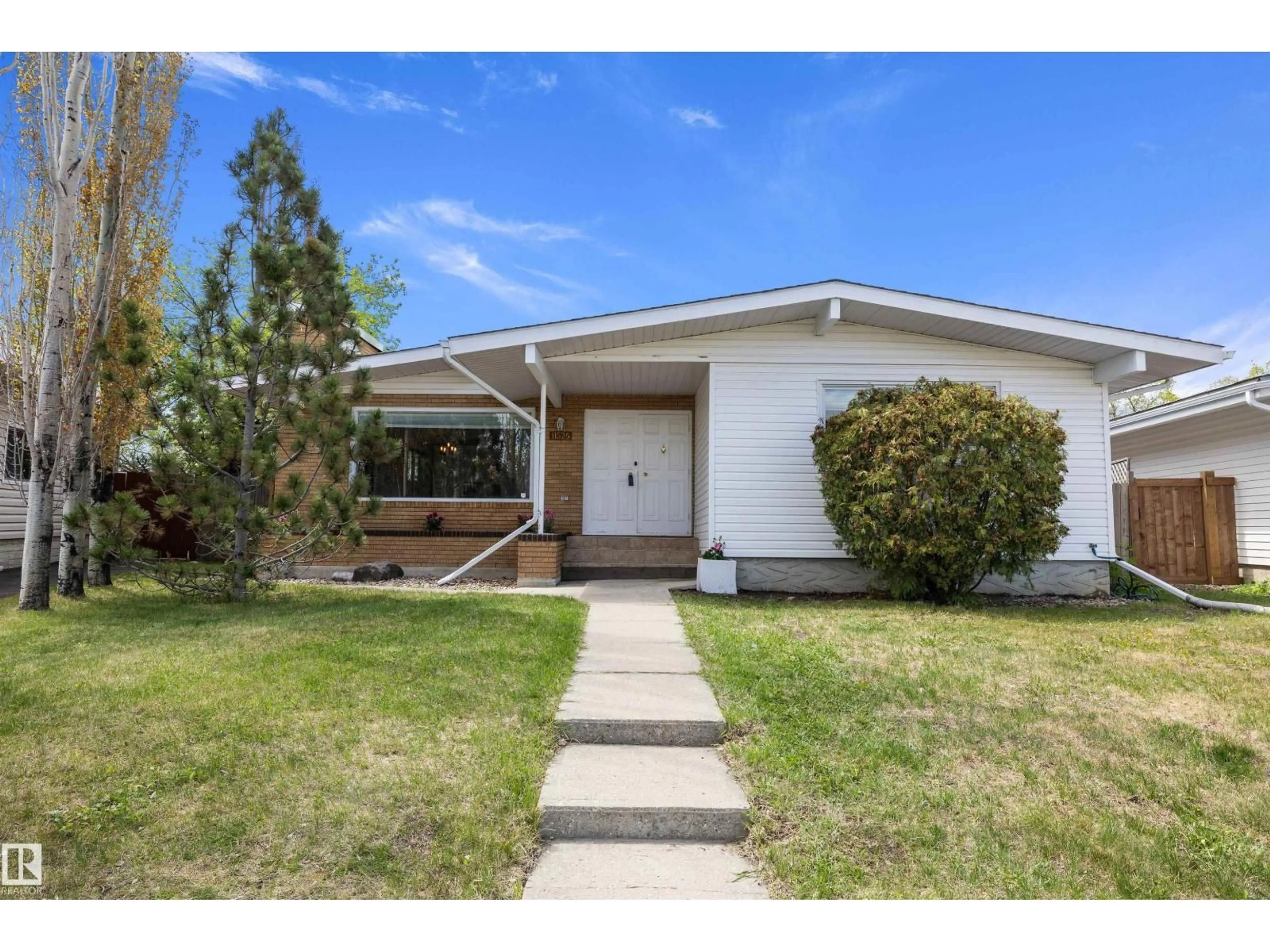 Home with vinyl exterior material, street for 11525 37A AV NW, Edmonton Alberta T6J0J6