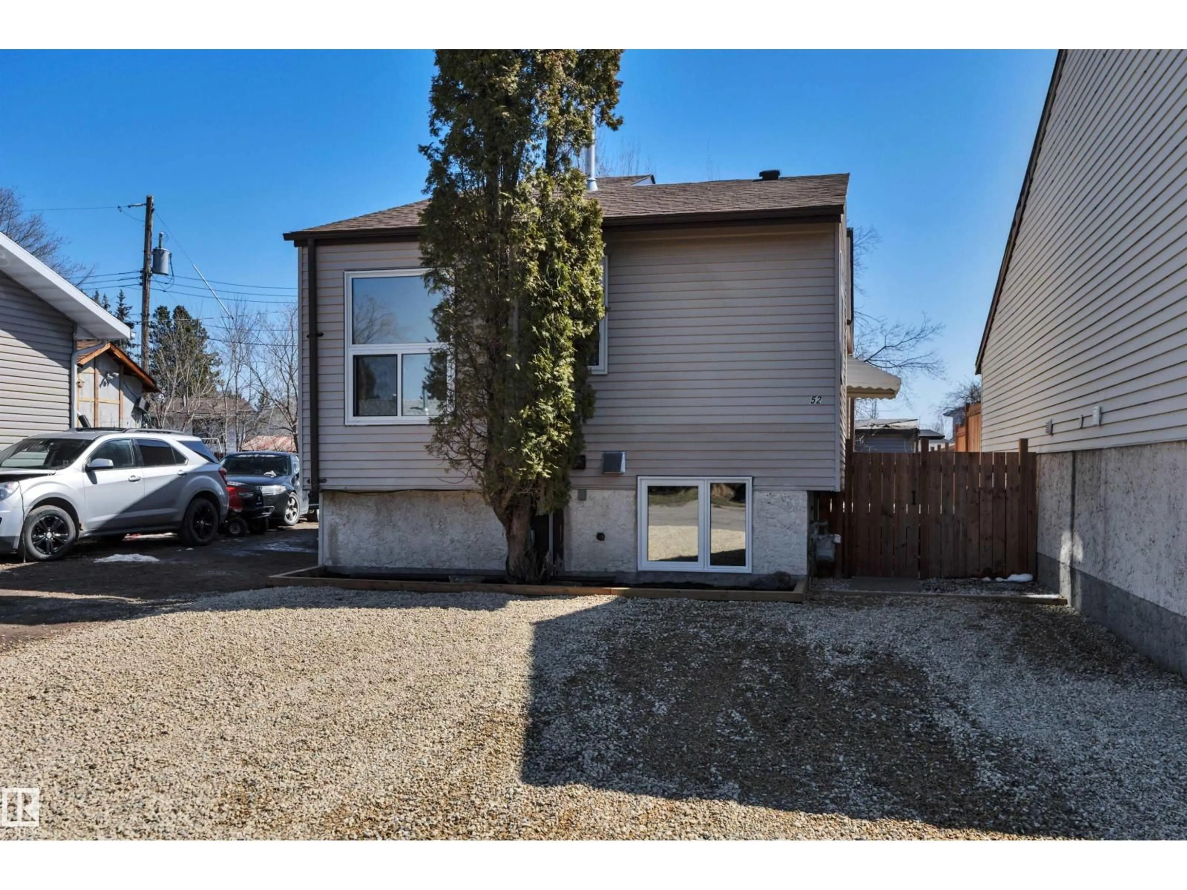 Home with vinyl exterior material, street for 52 PIPESTONE DR, Devon Alberta T9G1T3
