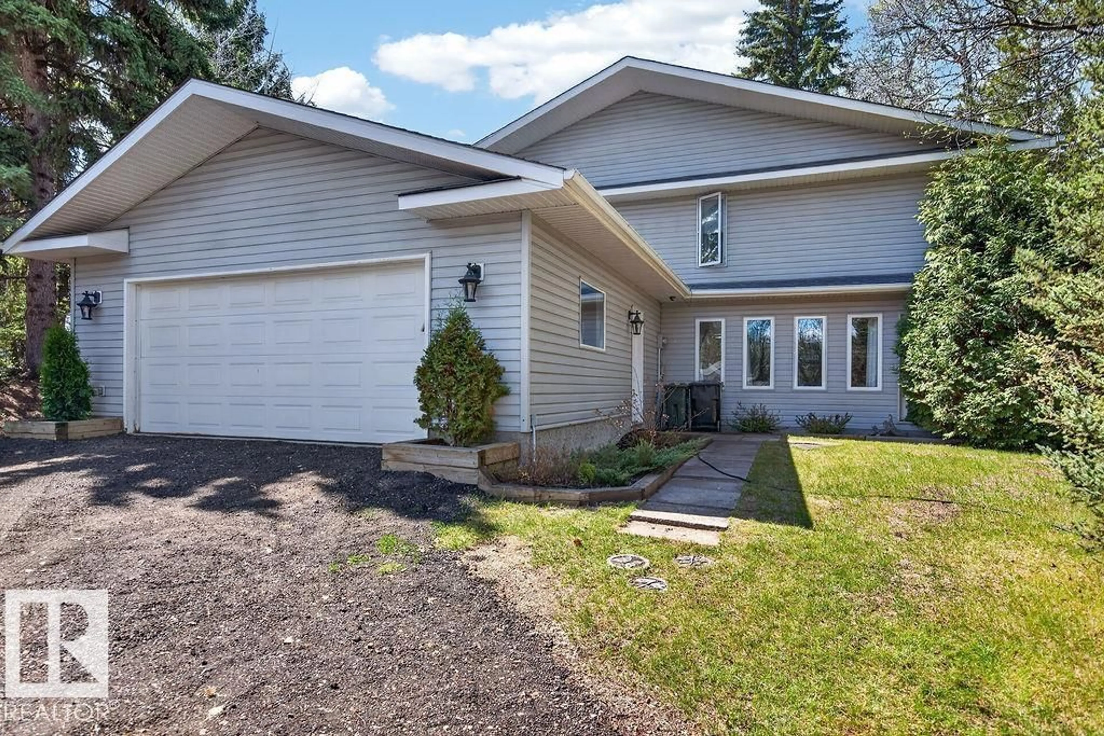 Home with vinyl exterior material, street for 49 52257 RGE ROAD 231, Rural Strathcona County Alberta T8B1A7