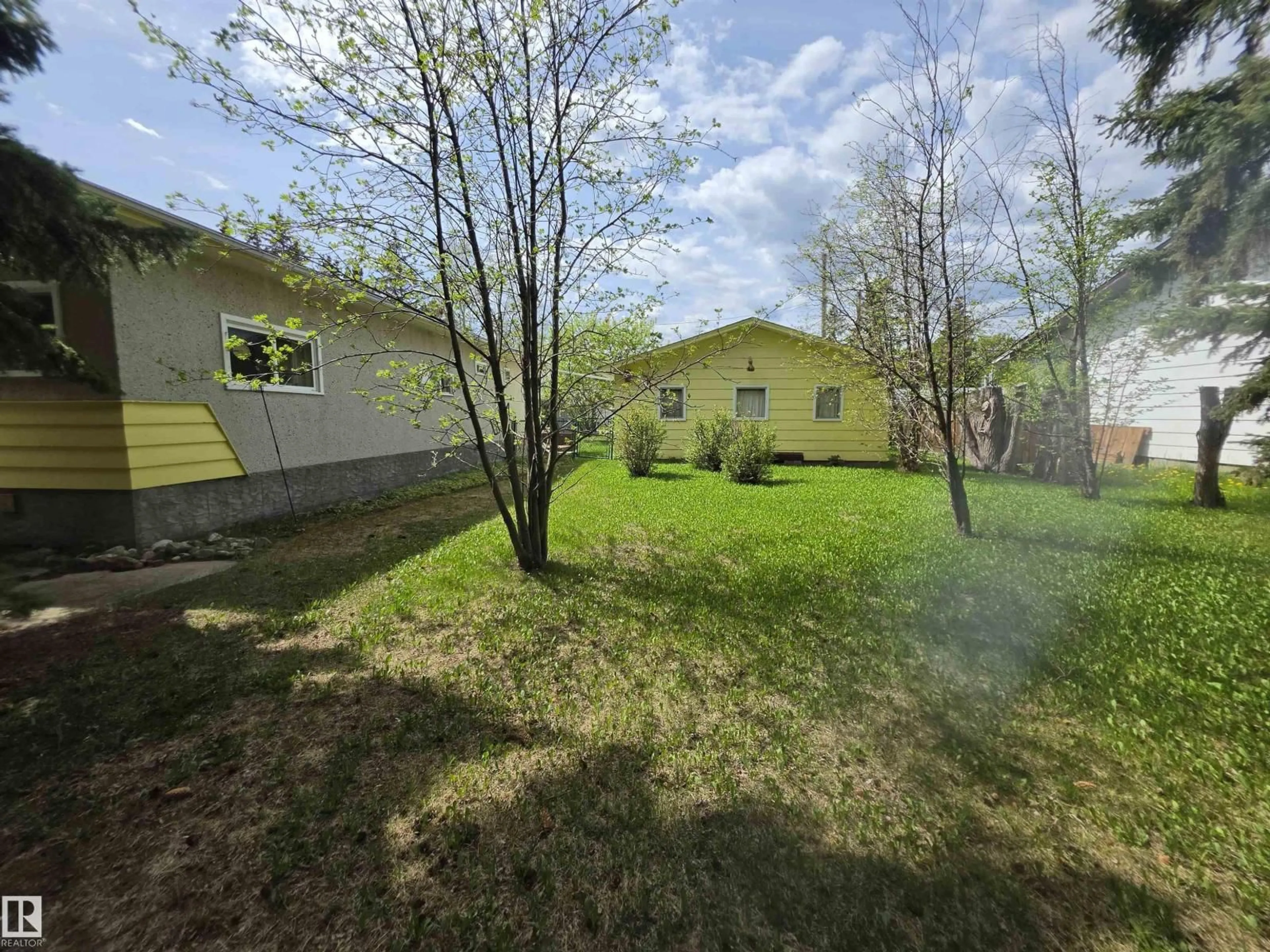 A pic from outside/outdoor area/front of a property/back of a property/a pic from drone, forest/trees view for 4512 45 AV, Rural Lac Ste. Anne County Alberta T0E0A0