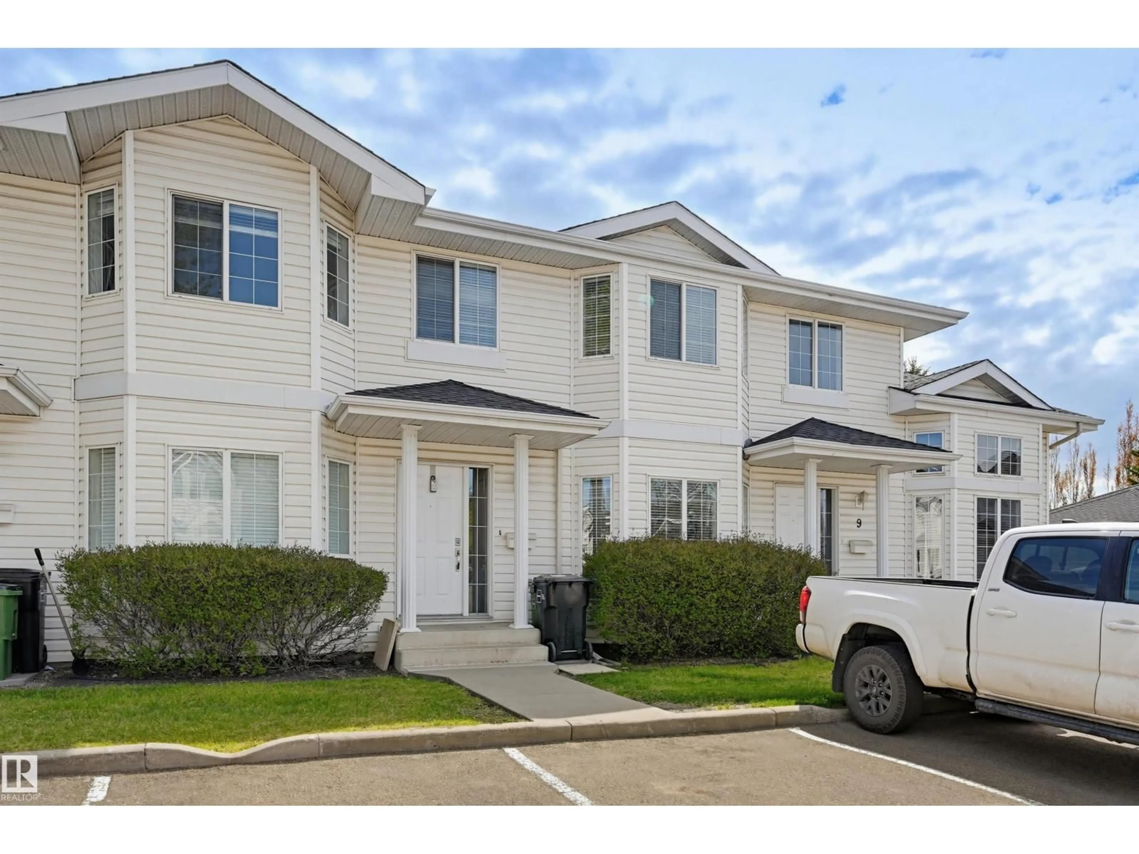 Home with vinyl exterior material, street for 11 - 3380 28A AV, Edmonton Alberta T6T1V4