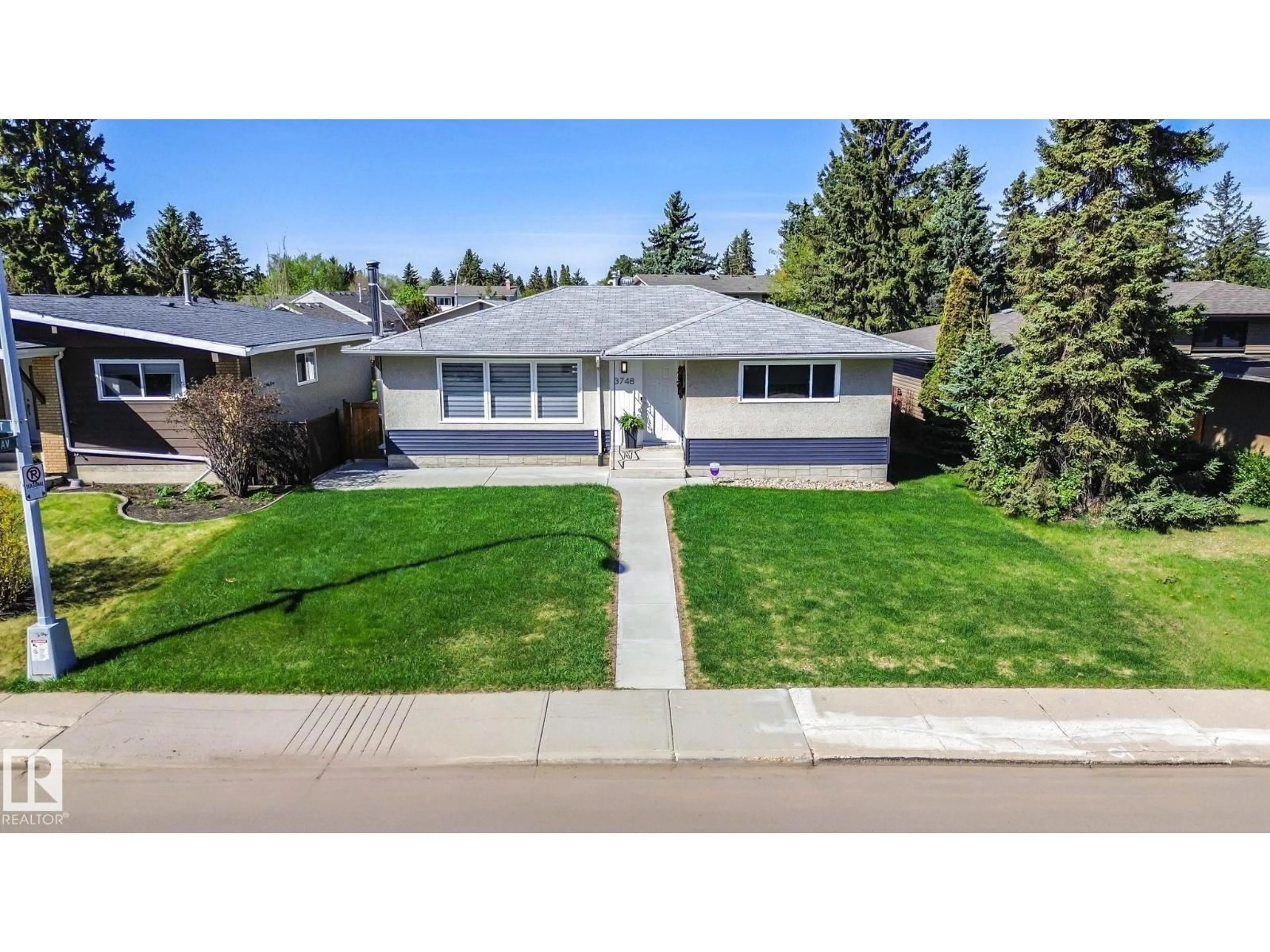 Home with vinyl exterior material, street for 3748 117 ST, Edmonton Alberta T6J1S7